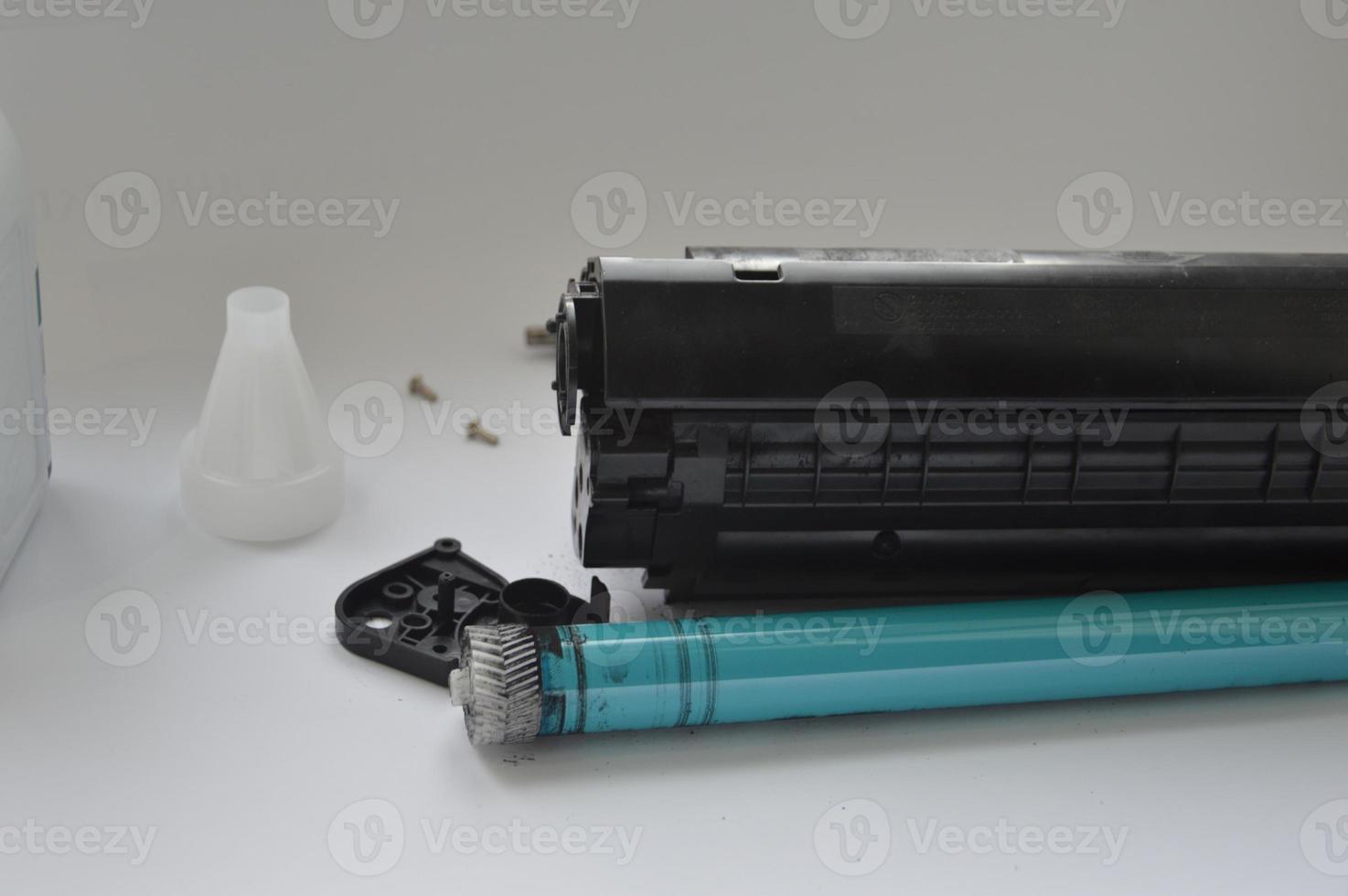 Charging the laser printer cartridge with toner powder photo