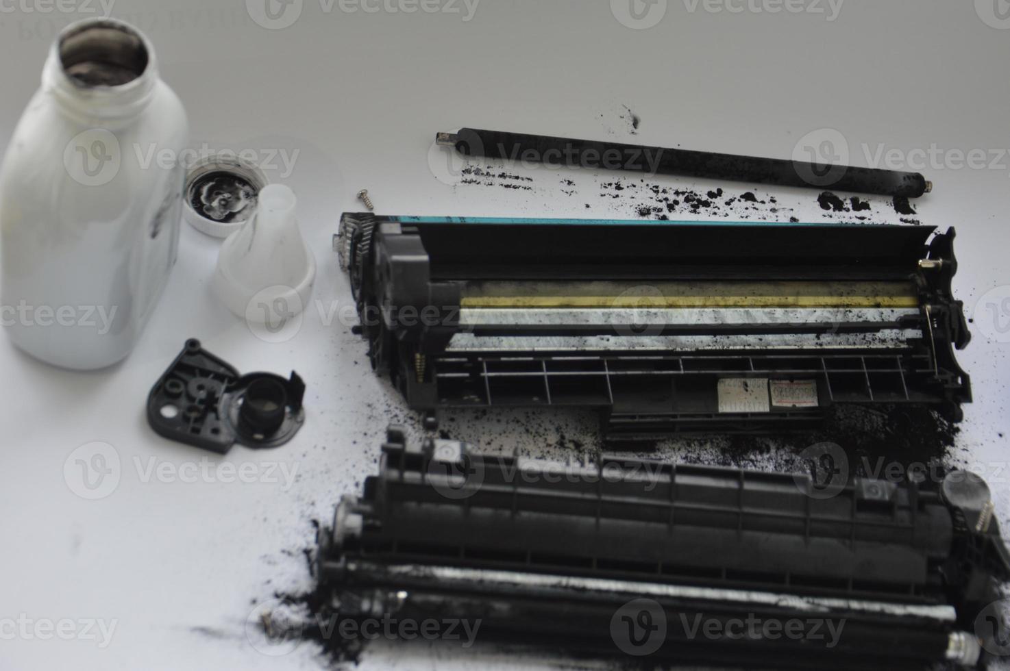 Charging the laser printer cartridge with toner powder 7114146 Stock