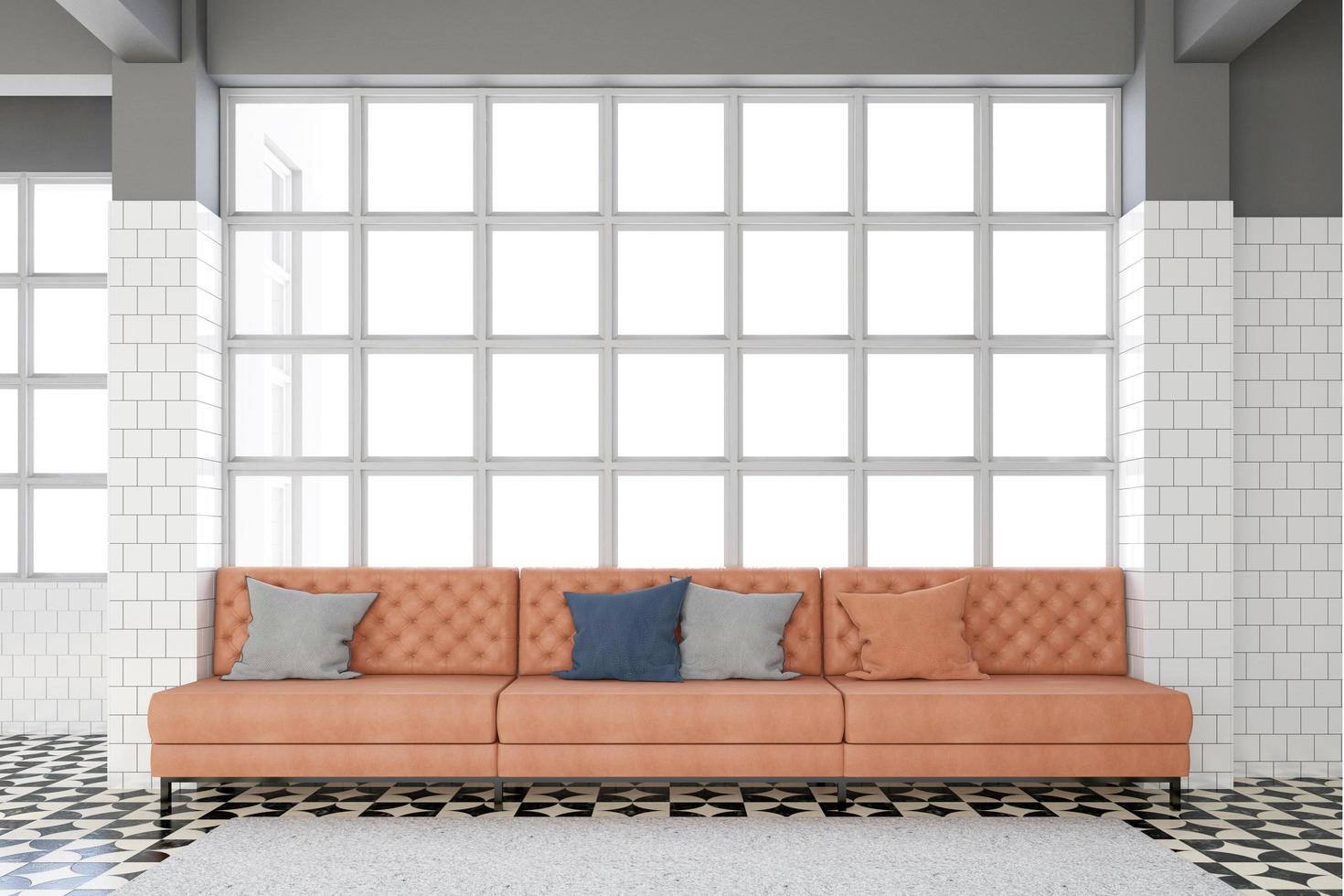 sala de estar con lujoso sofá de piel naranja, ventanas blancas y cristal transparente, moqueta blanca y suelo de mármol. representación 3d foto