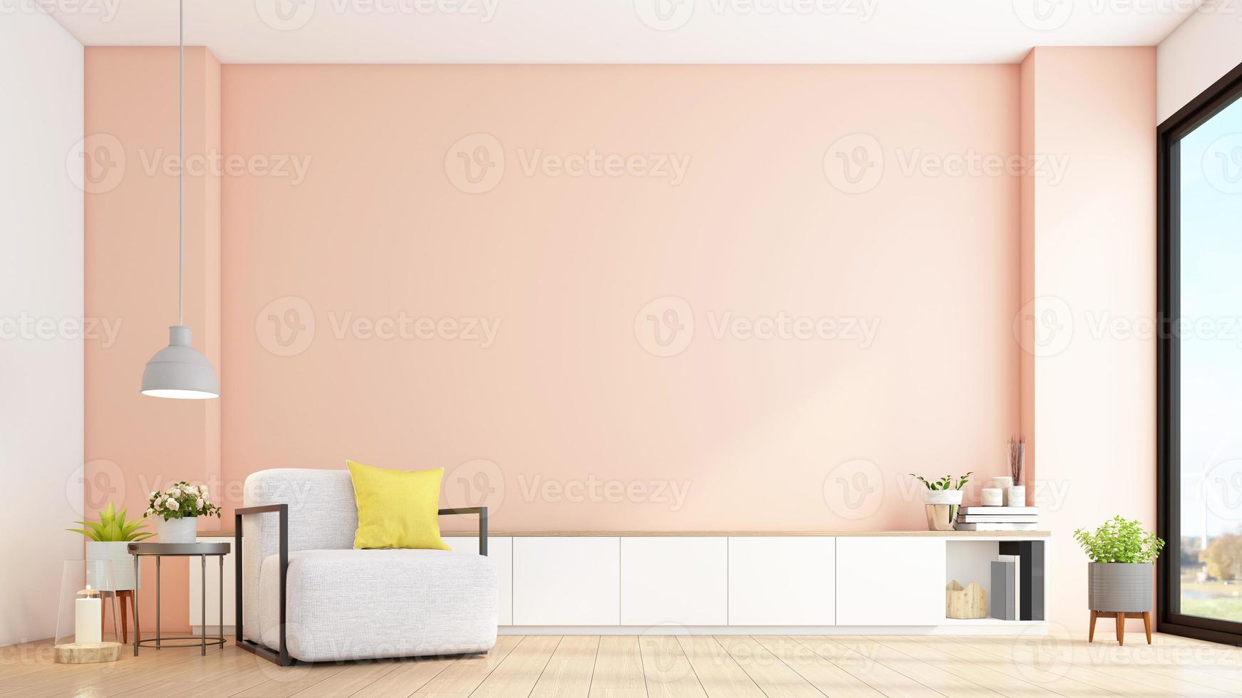 White cabinet for tv on the light orange wall in living room with armchair and minimalist design. 3d rendering photo