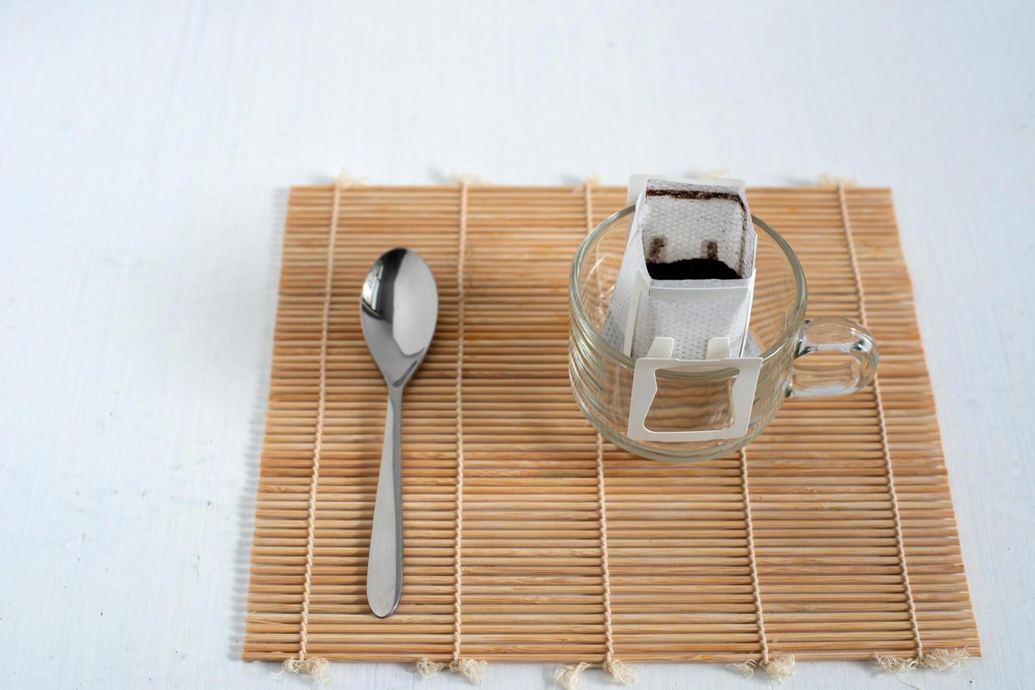 Dipping Coffee on white wood table photo