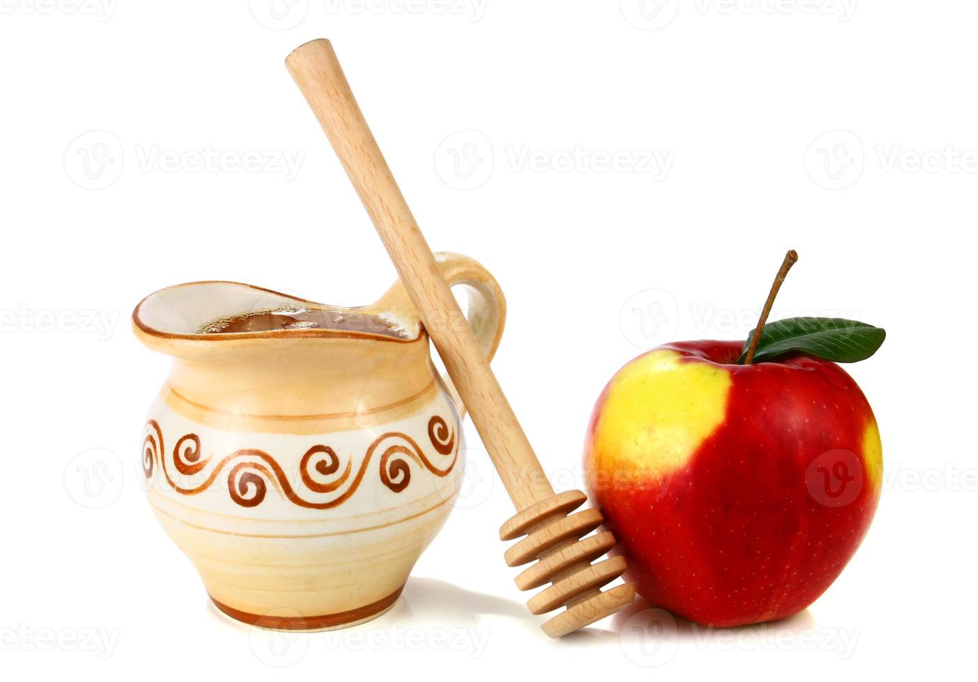 honey in a jug and apple photo