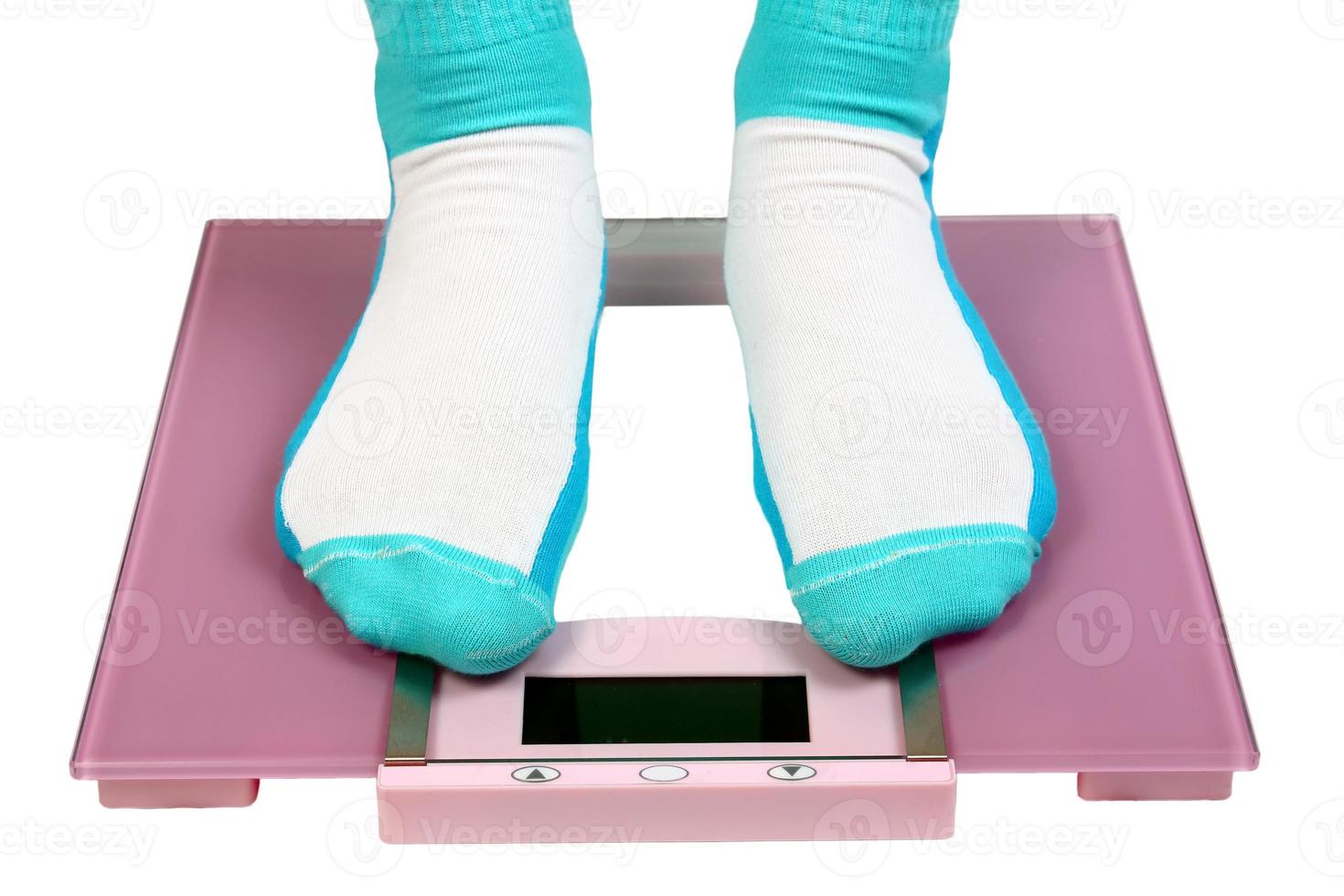 woman feet on floor scales photo