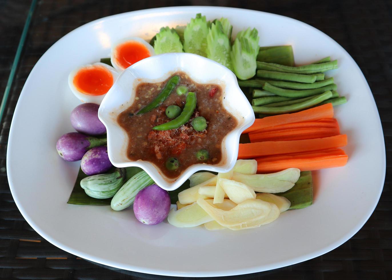 Nam Prik Kapi, Spicy shrimp paste sauce served with mixed vegetables. photo
