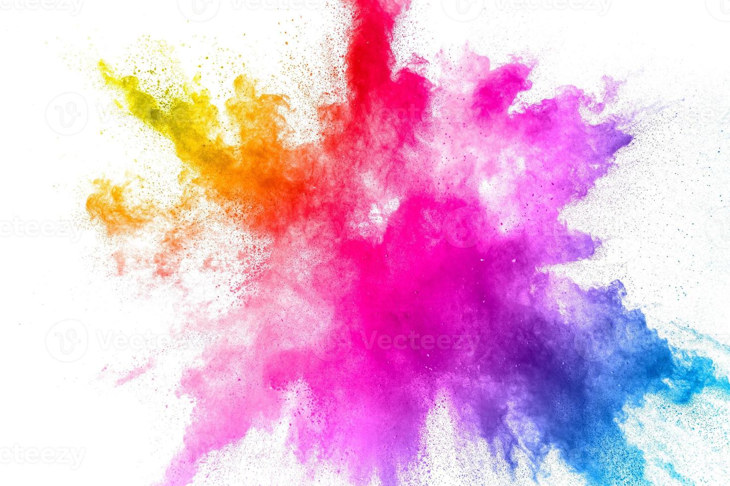 Colorful powder explosion on white background. Abstract pastel color dust particles splash. photo