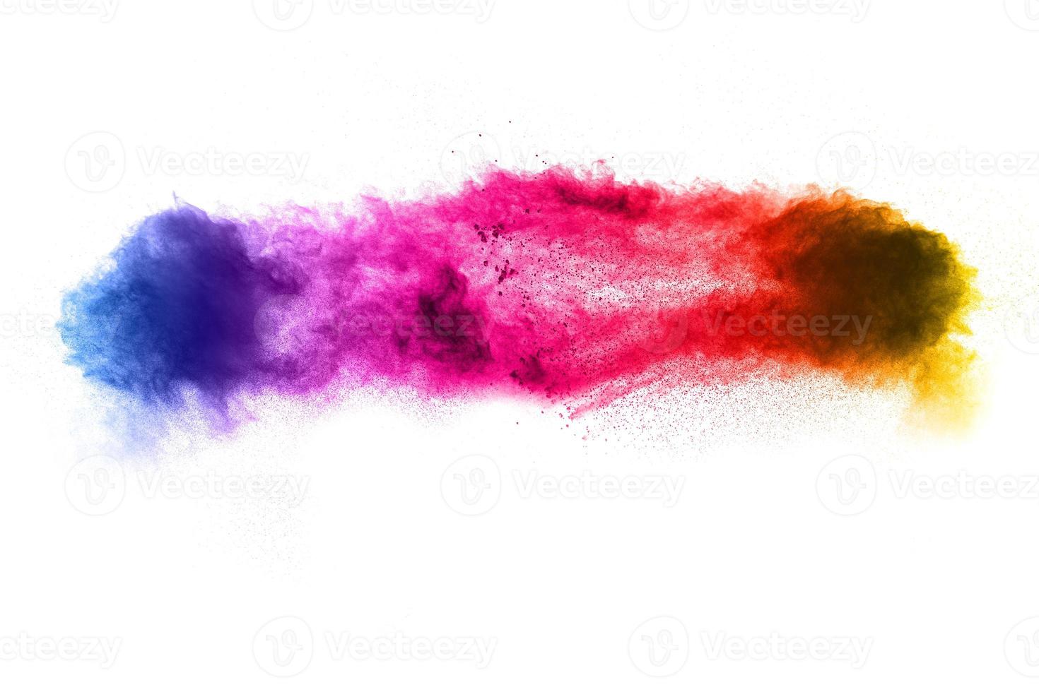 Freeze motion of colorful dust particles on white background.Abstract pastel color powder overlay texture. photo