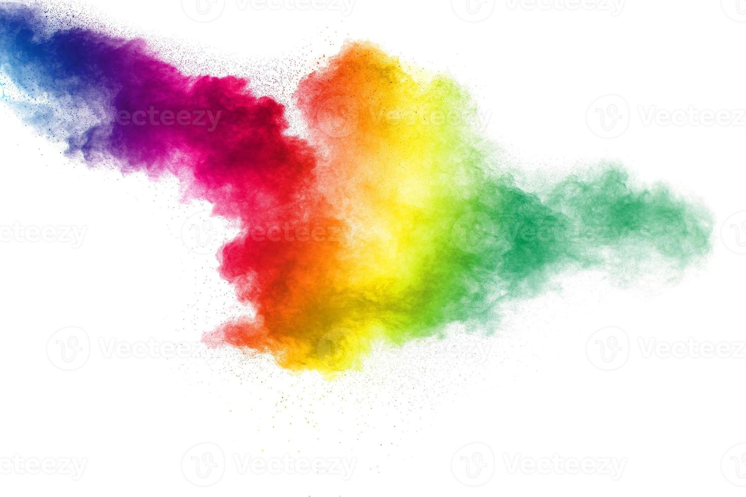 Colorful powder explosion on white background. Abstract pastel color dust particles splash. photo