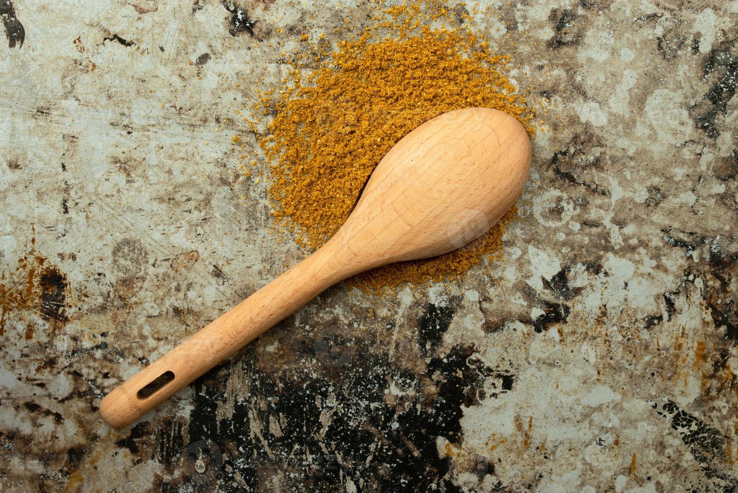 Ras El Hanout Seasoning Spilled from a Teaspoon photo