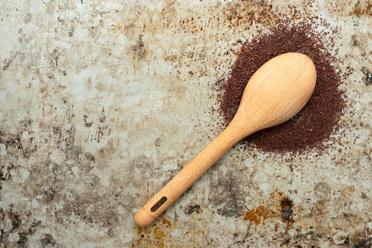 Ground Sumac Spilled from a Teaspoon photo