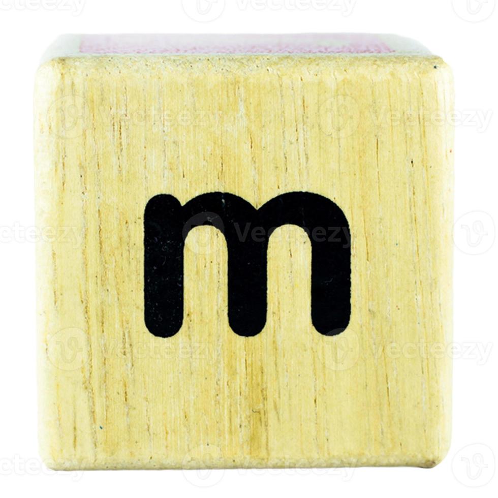 M text letters written on wooden cubes photo