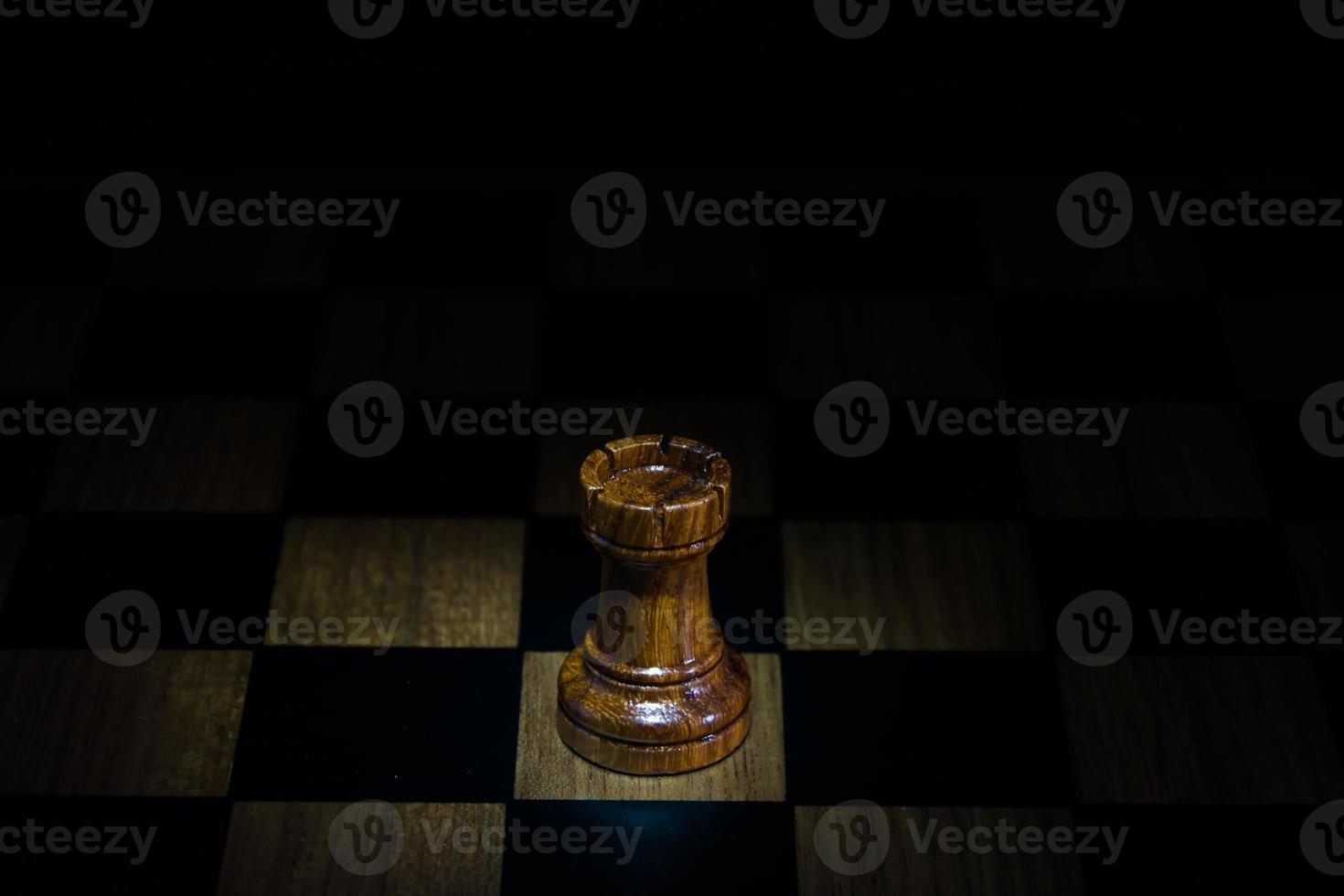 chess figure on chess board game concept for ideas black background photo