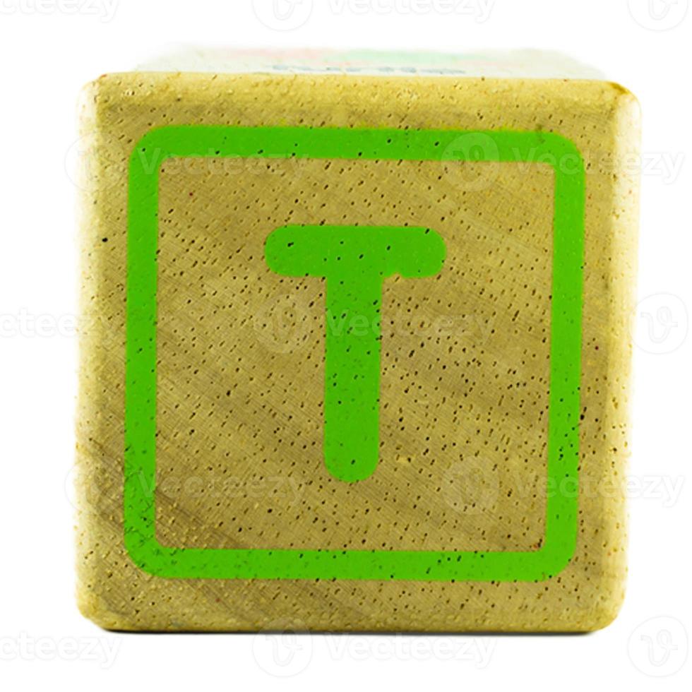T text letters written on wooden cubes photo