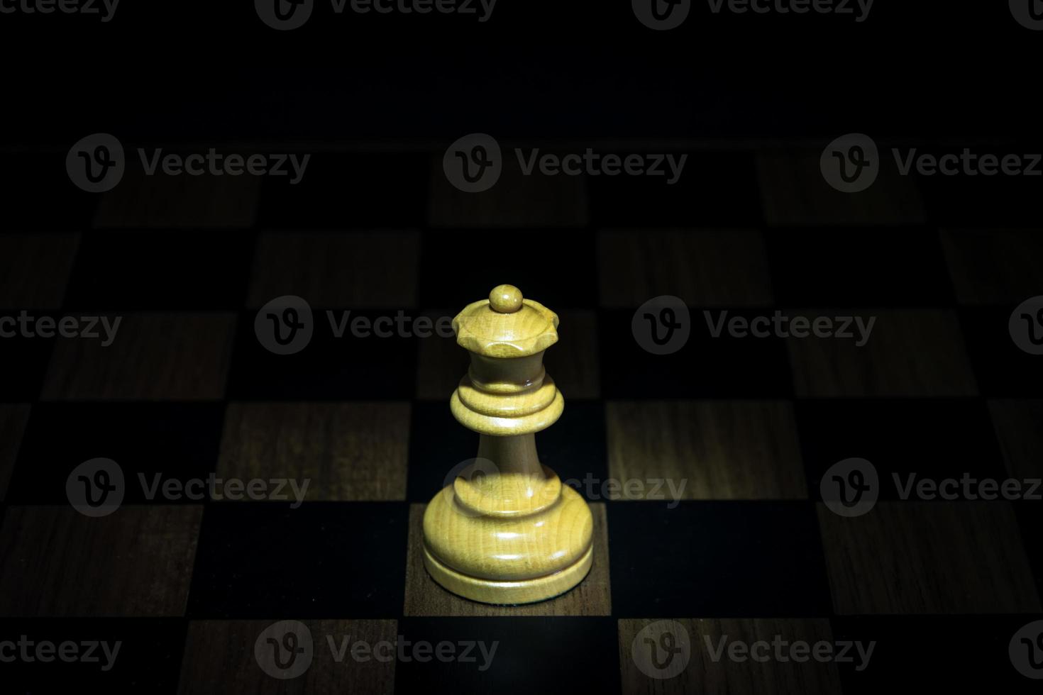 chess figure on chess board game concept for ideas black background photo