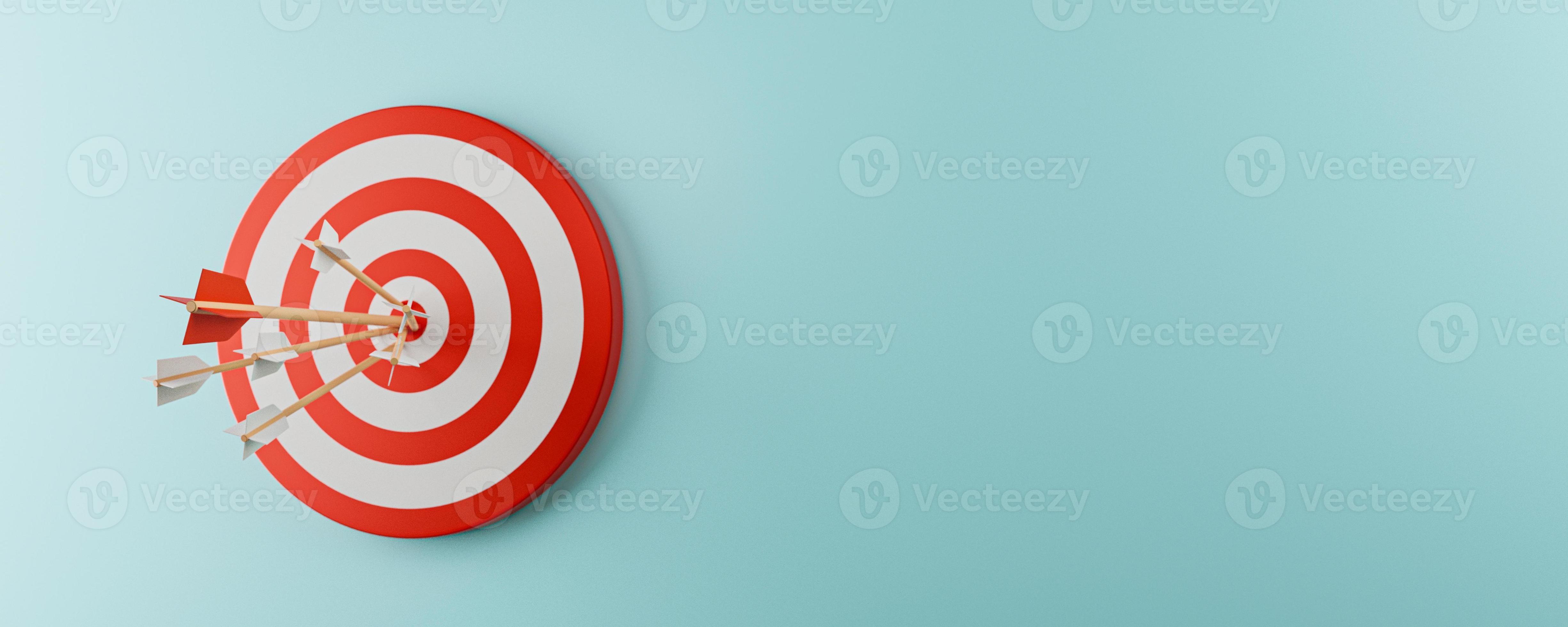 Target board with arrow on the blue background and copy space for