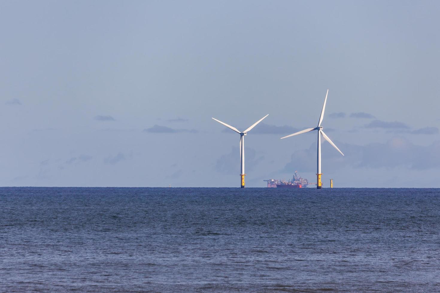 COLWYN BAY, WALES, UK, 2012.  Wind turbines off shore photo