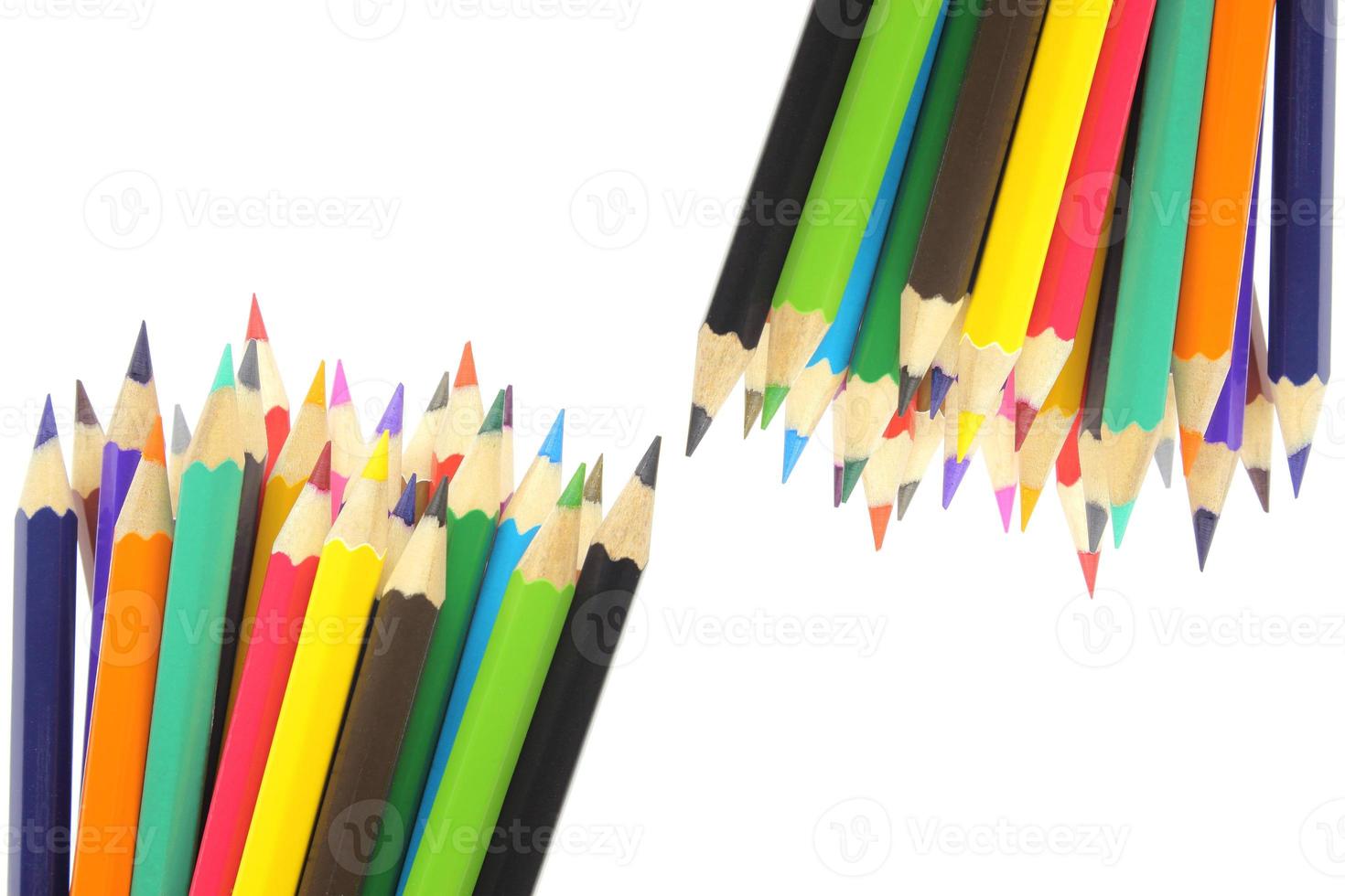 Coloured pencils isolated on white background photo