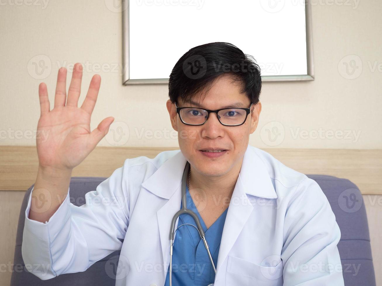 Hospital clinic laboratory male doctor nurse scientist work job career medic cheerful pointing finger hand computer notebook tablet technology digital online treatment health care patient say hello photo