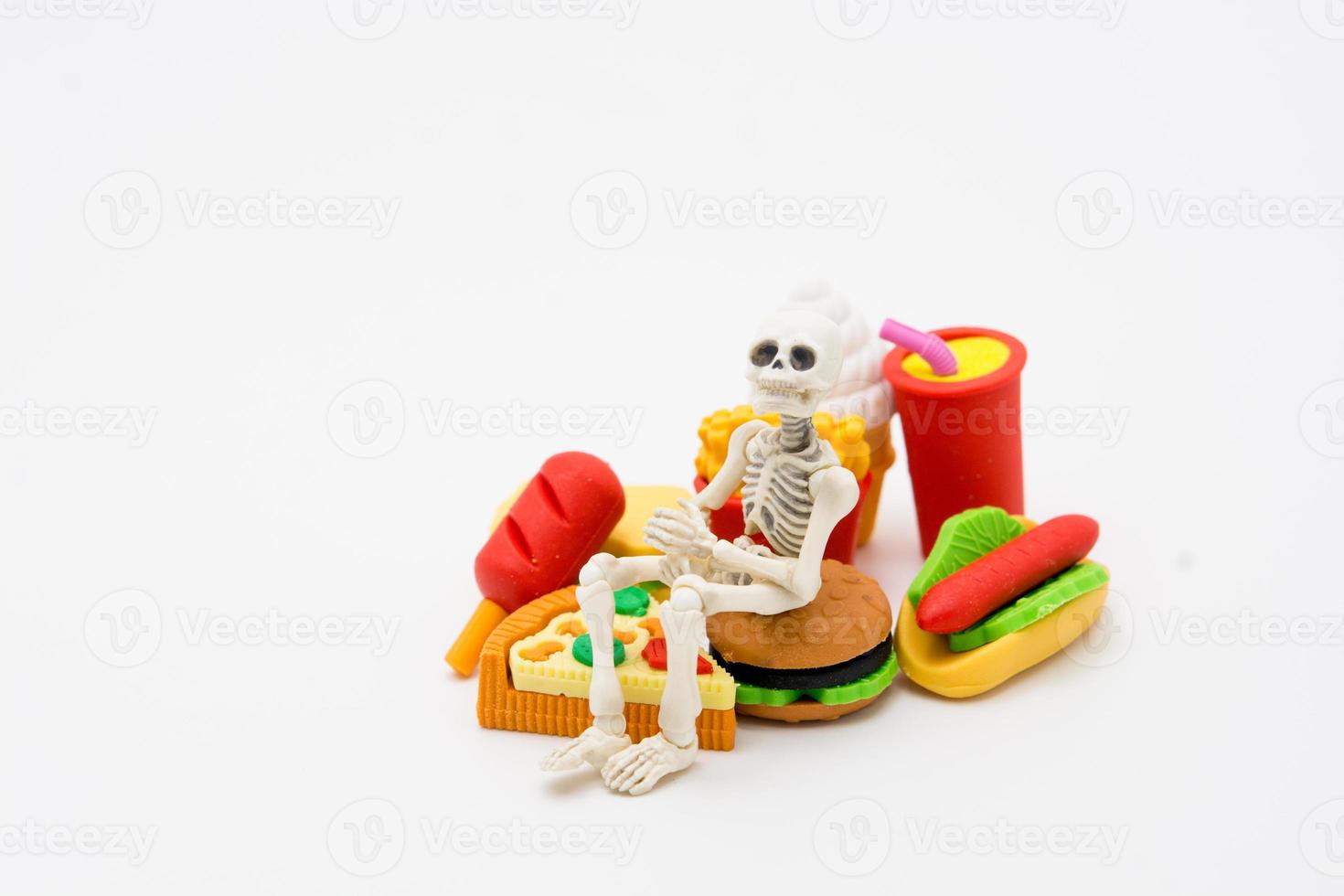 Skeleton and foods, enjoy eating until death photo