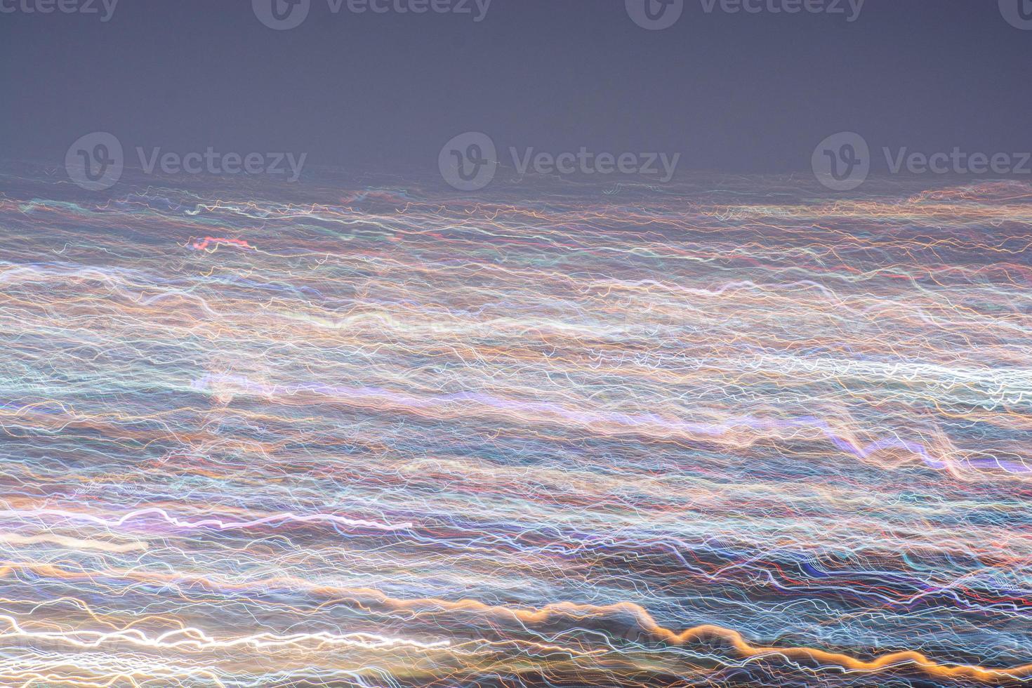 Abstract long exposure, experimental surreal photo, city and vehicle lights at night photo