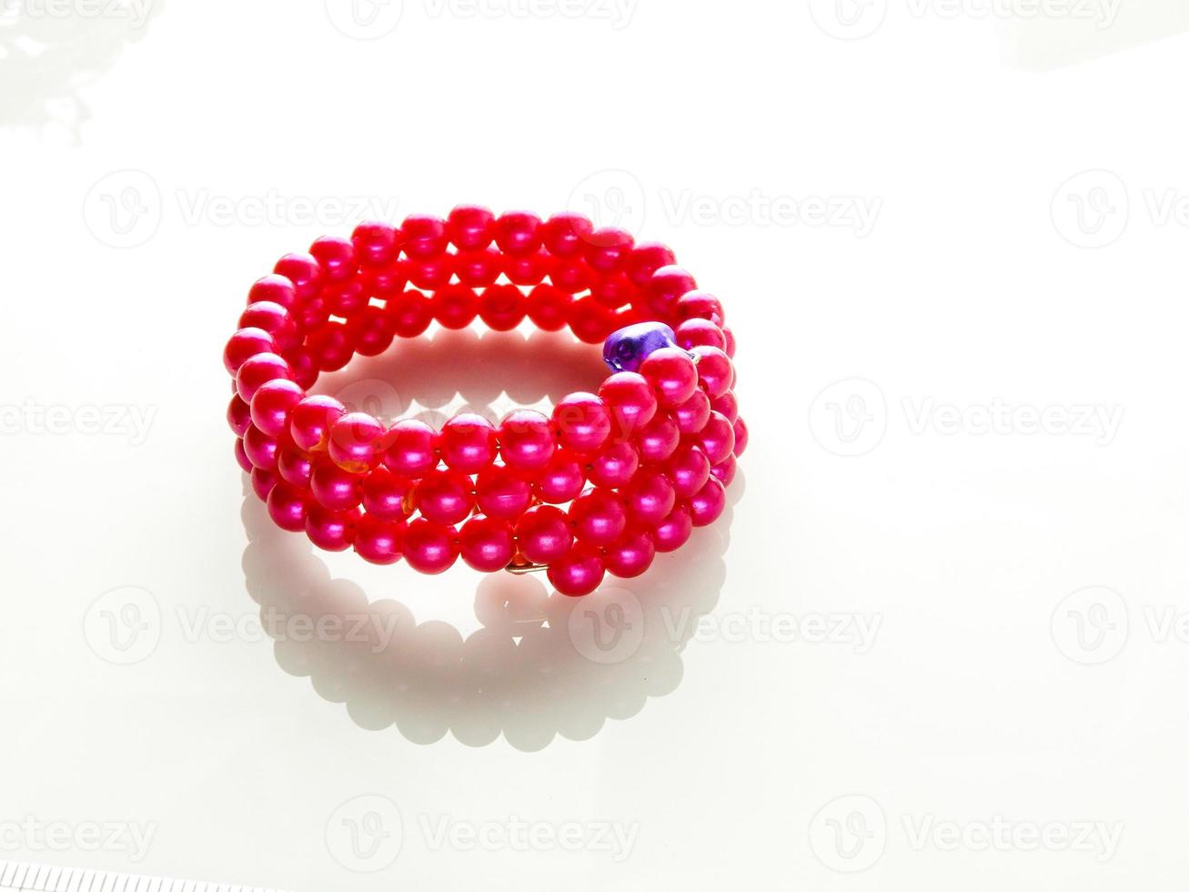 Multi-colored bracelets with beads. Colourful child's bead bracelet. photo