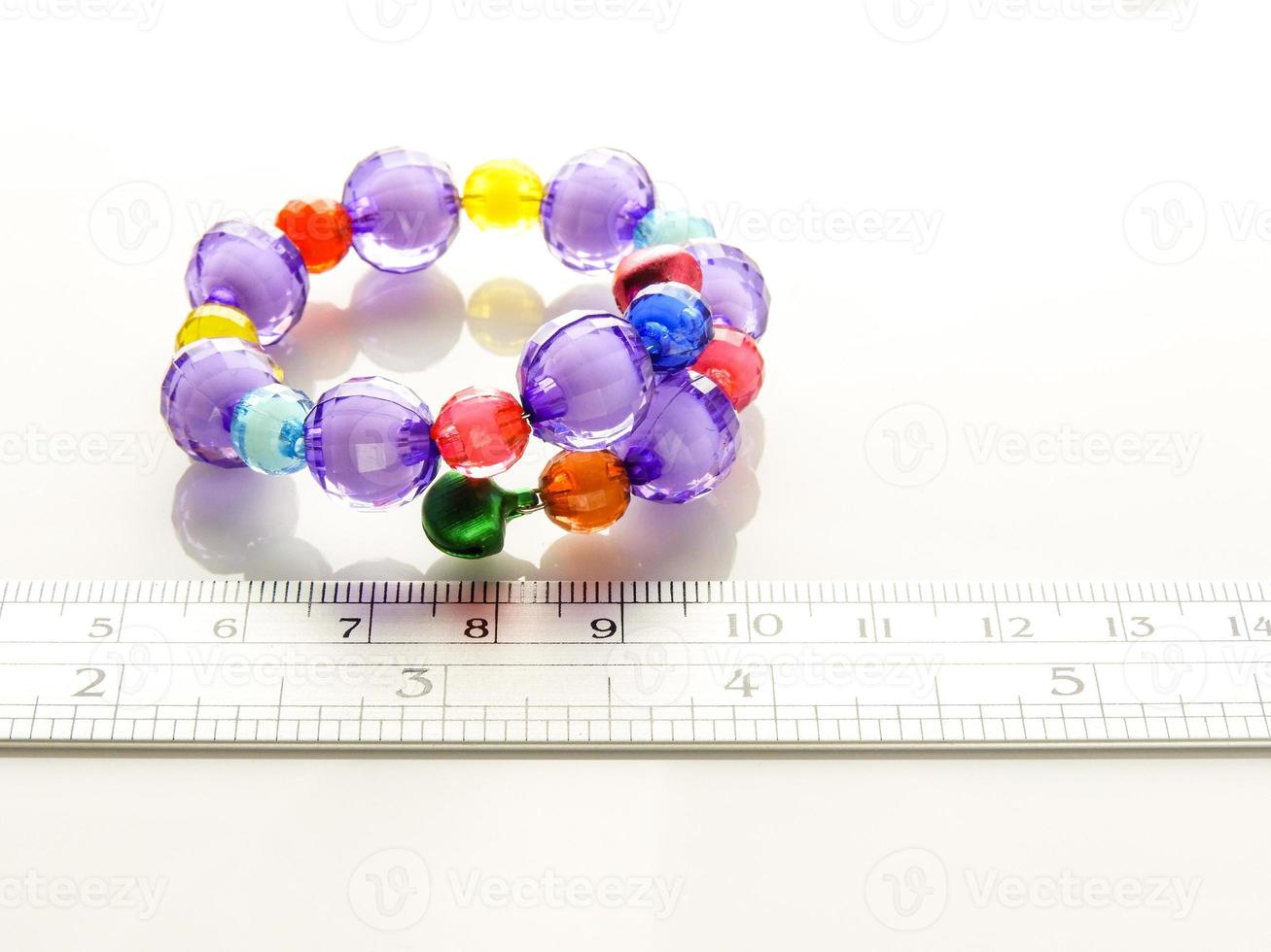 Multi-colored bracelets with beads photo