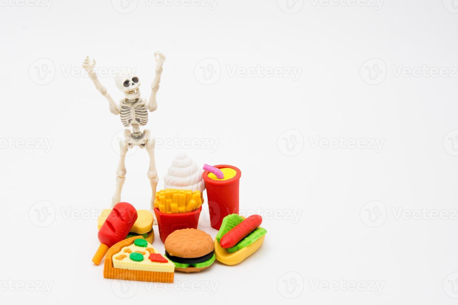 Skeleton and foods, enjoy eating until death photo