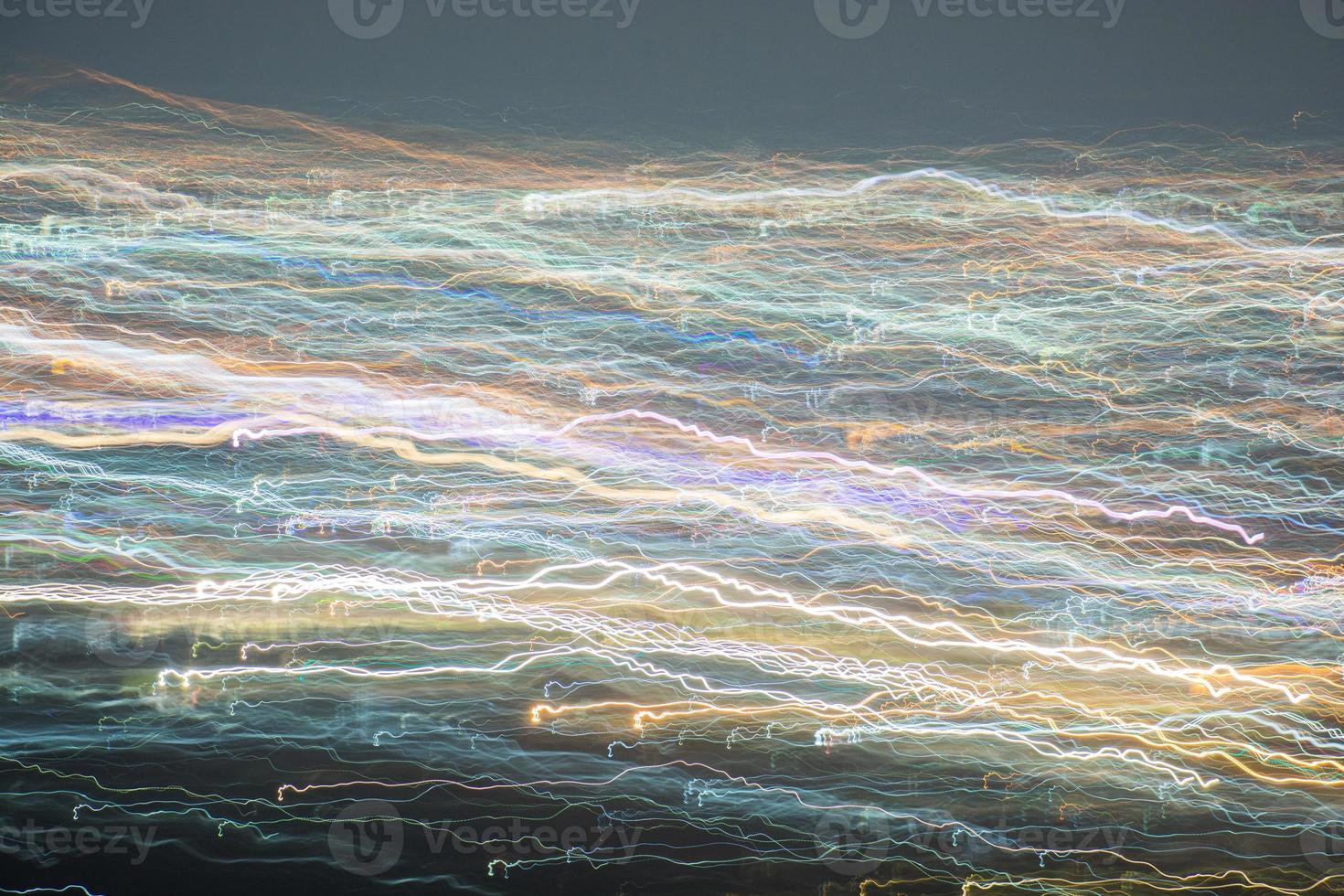 Abstract long exposure, experimental surreal photo, city and vehicle lights at night photo
