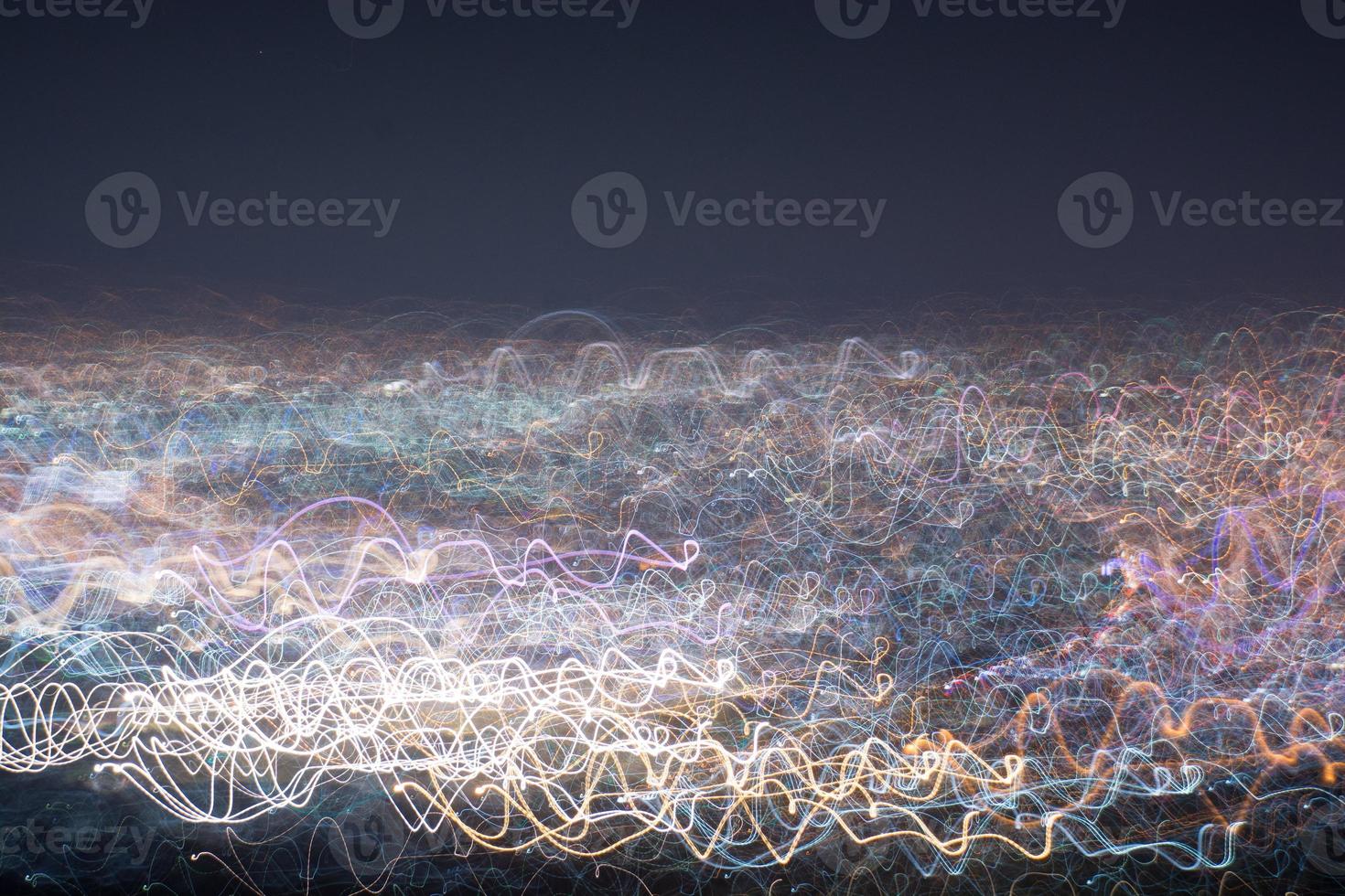 Abstract long exposure, experimental surreal photo, city and vehicle lights at night photo