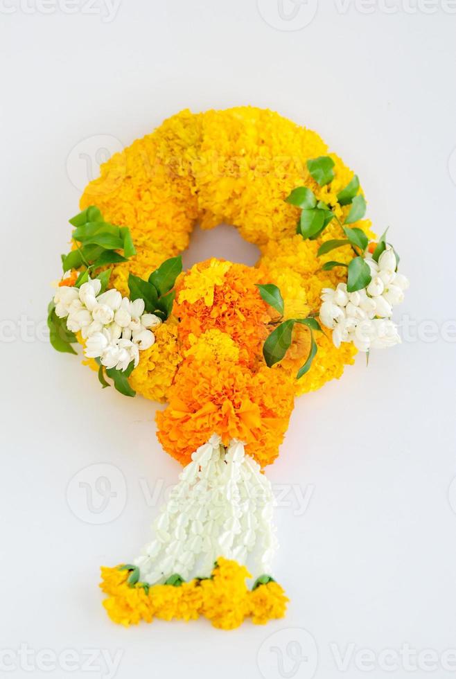 Marigold garland, flower garland white background photo