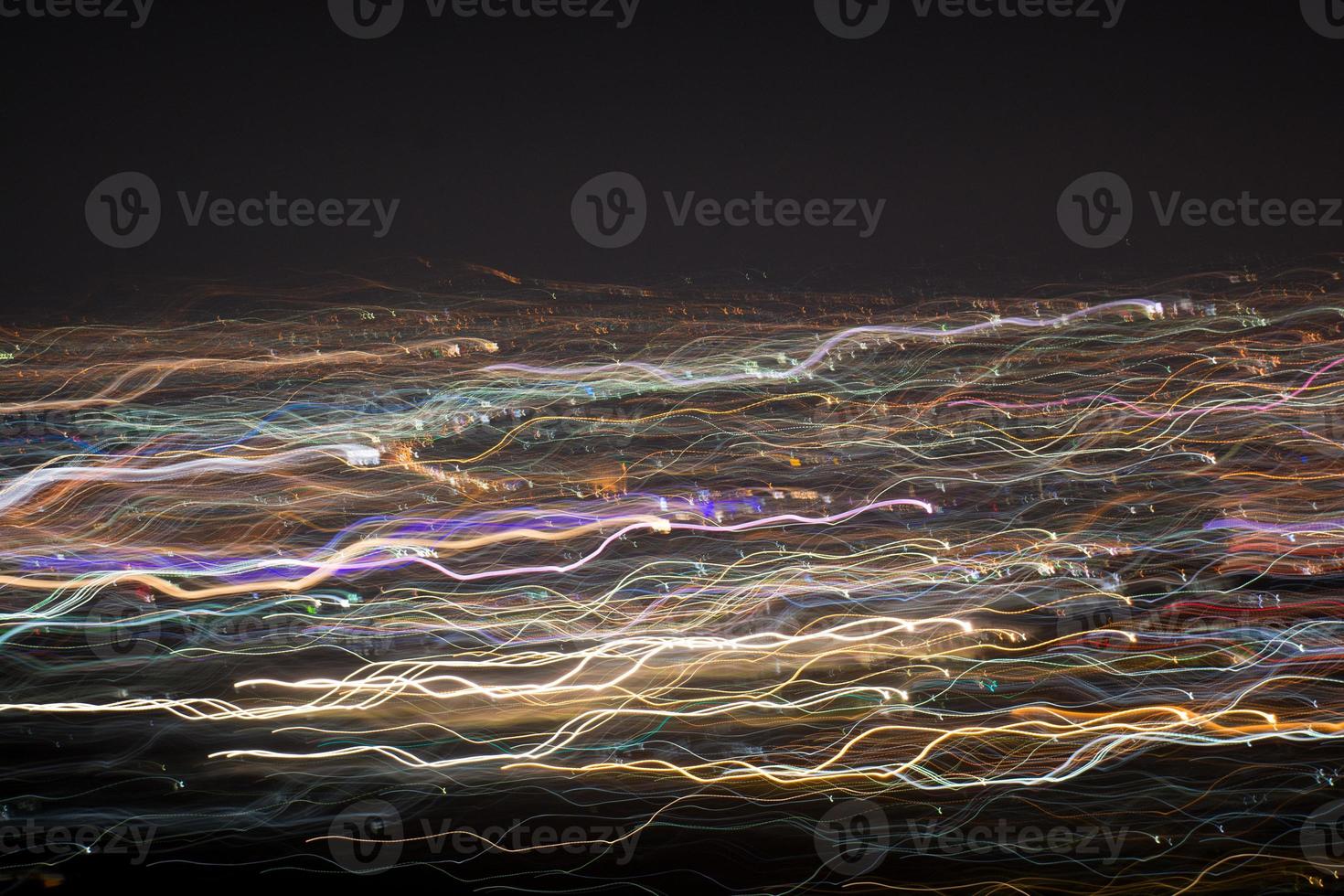 Abstract long exposure, experimental surreal photo, city and vehicle lights at night photo