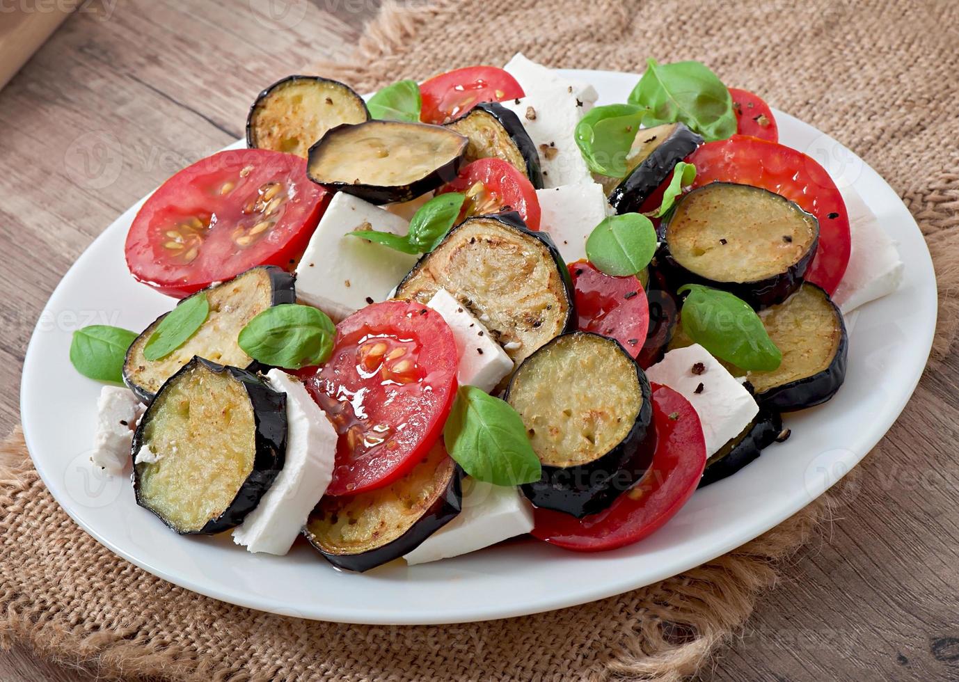 eggplant salad with tomato and feta cheese photo