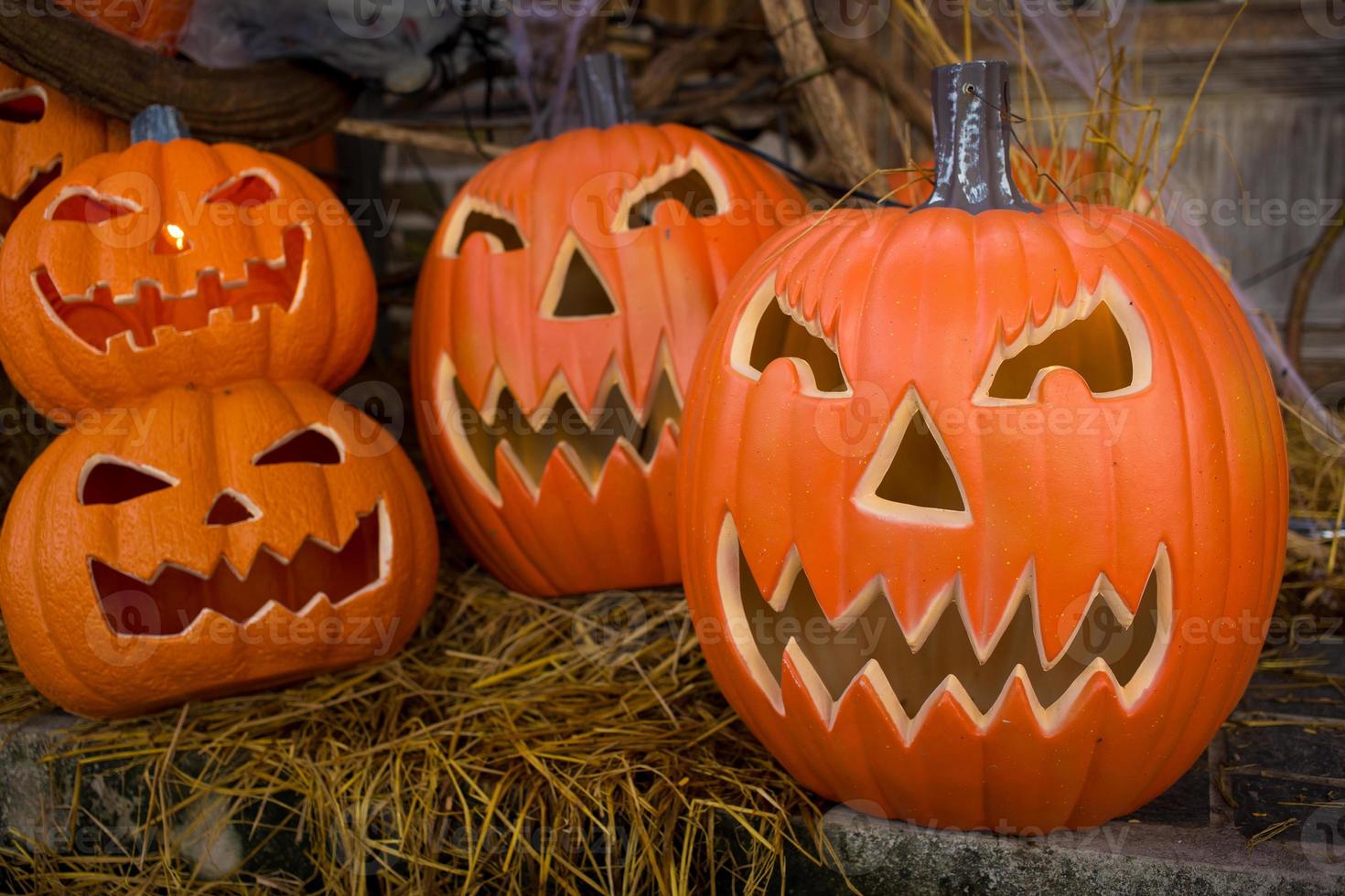 Craved pumpkin put on rice straw  in Halloween theme. photo