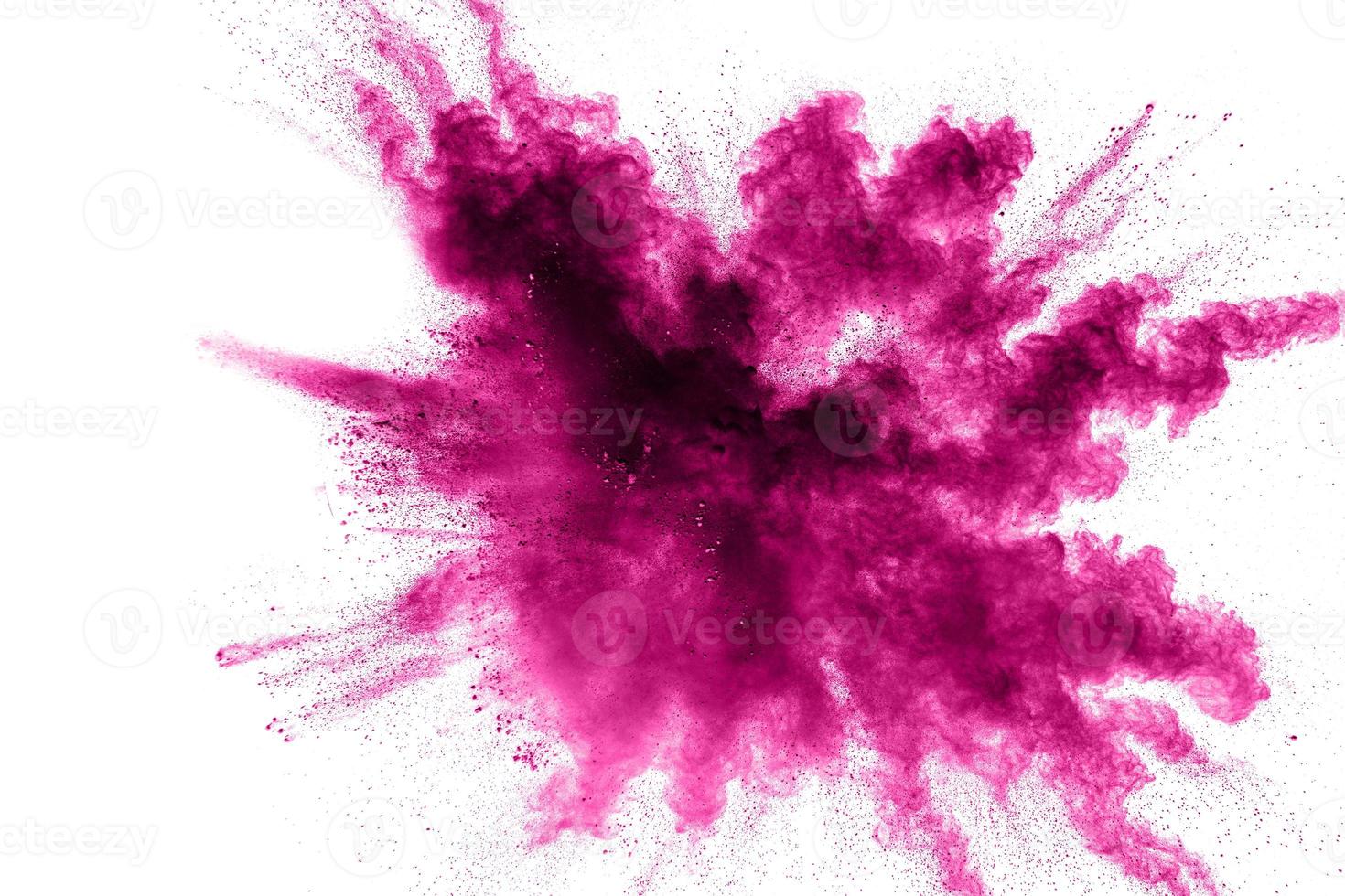 Pink powder explosion isolated on black background. photo