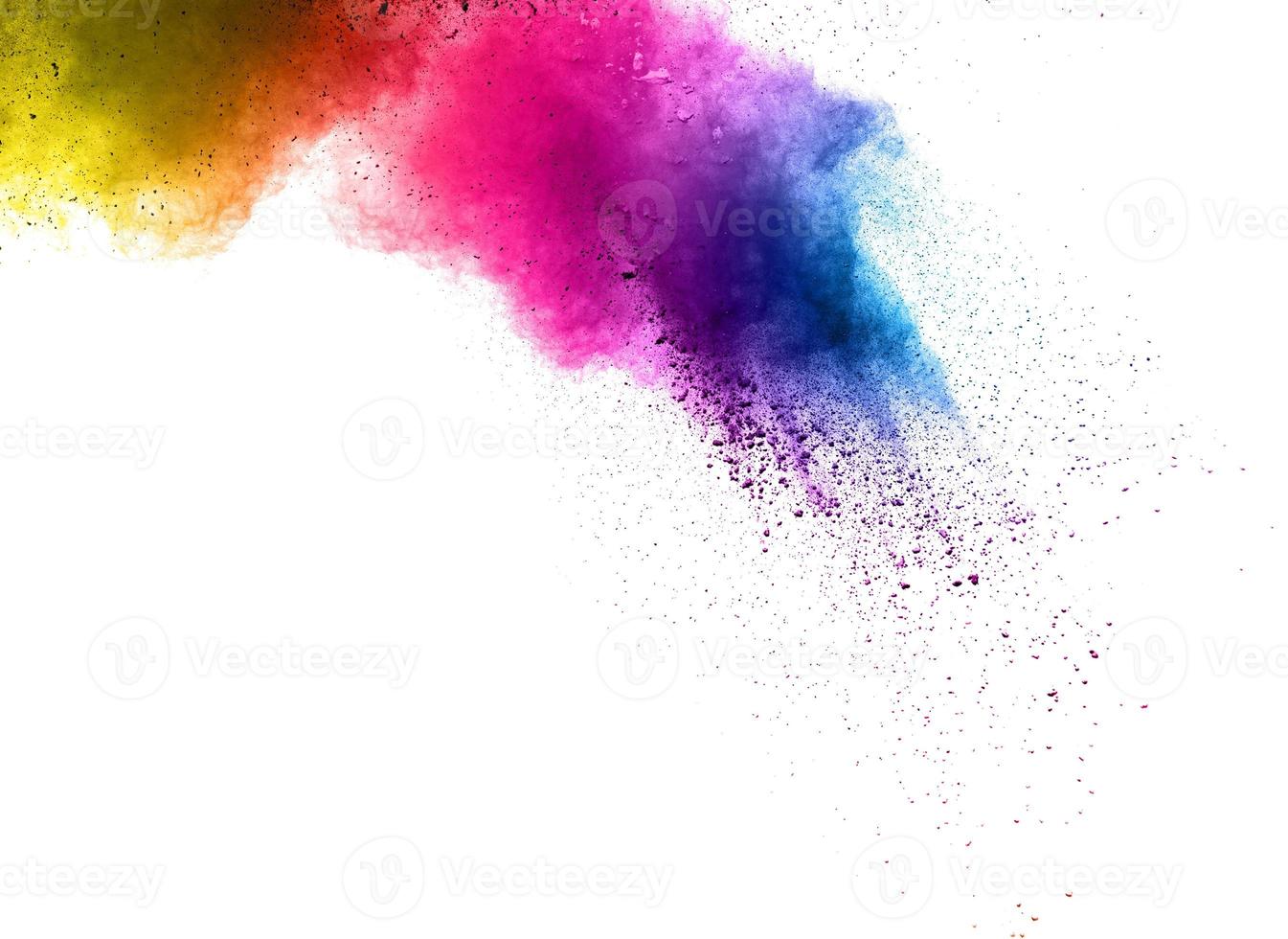 abstract multicolored powder splatted on white background,Freeze motion of color powder exploding photo