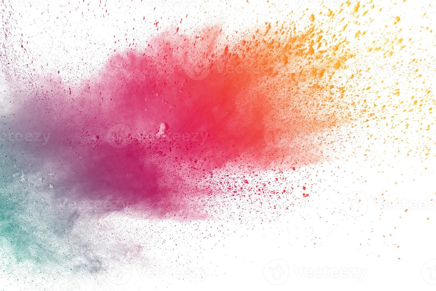 abstract multicolored powder splatted on white background,Freeze motion of color powder exploding photo