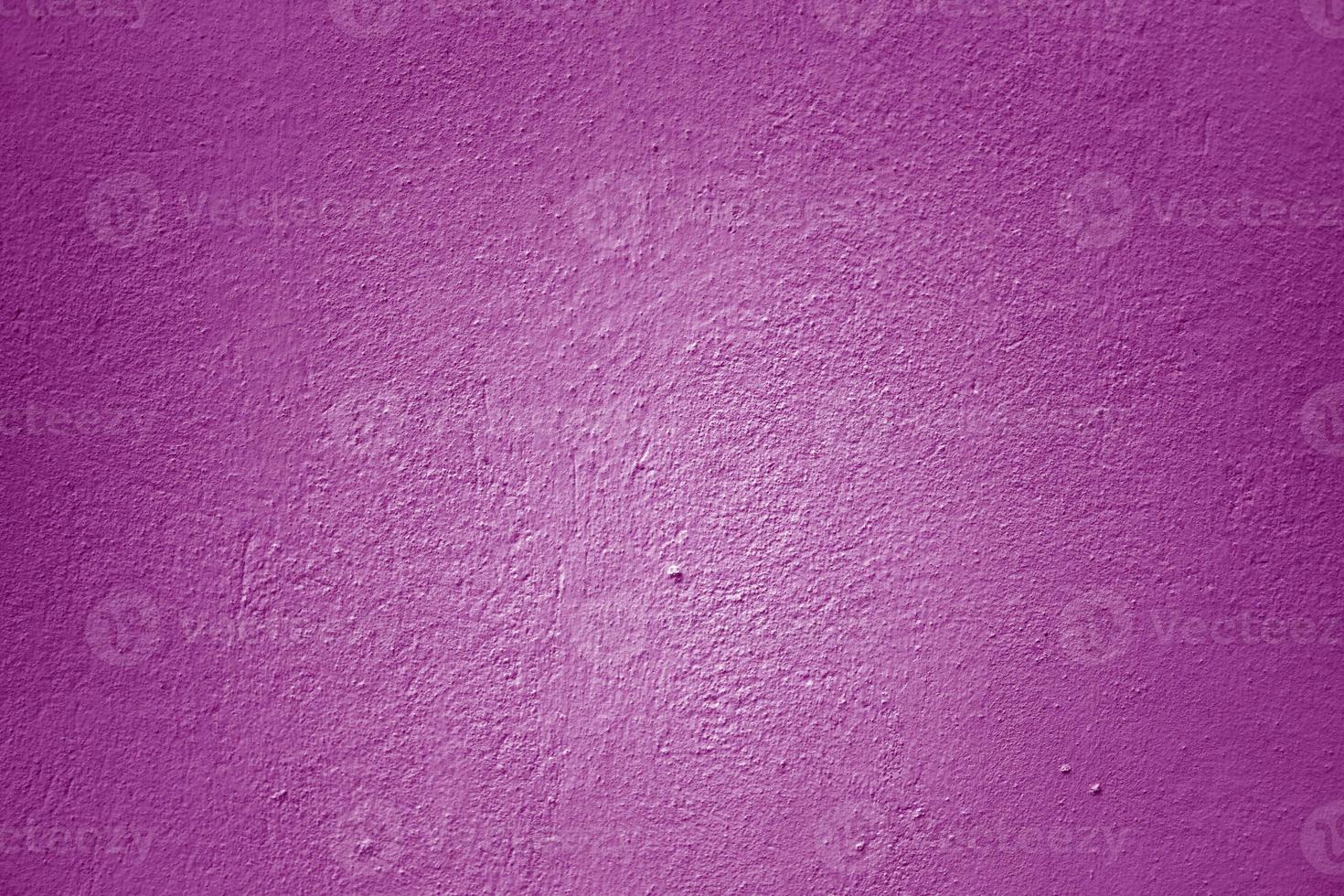 Fondo y textura de pared de cemento de colores abstractos. grunge púrpura pintado en la pared de hormigón. foto