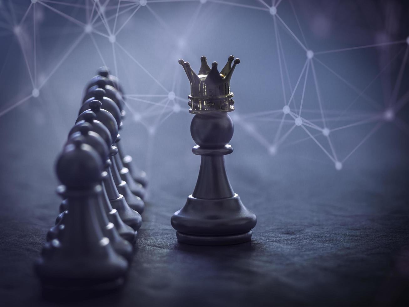 Golden king chess to fighting silver king chess to play successfully in the competition with technology network background. Management or leadership strategy concept. photo