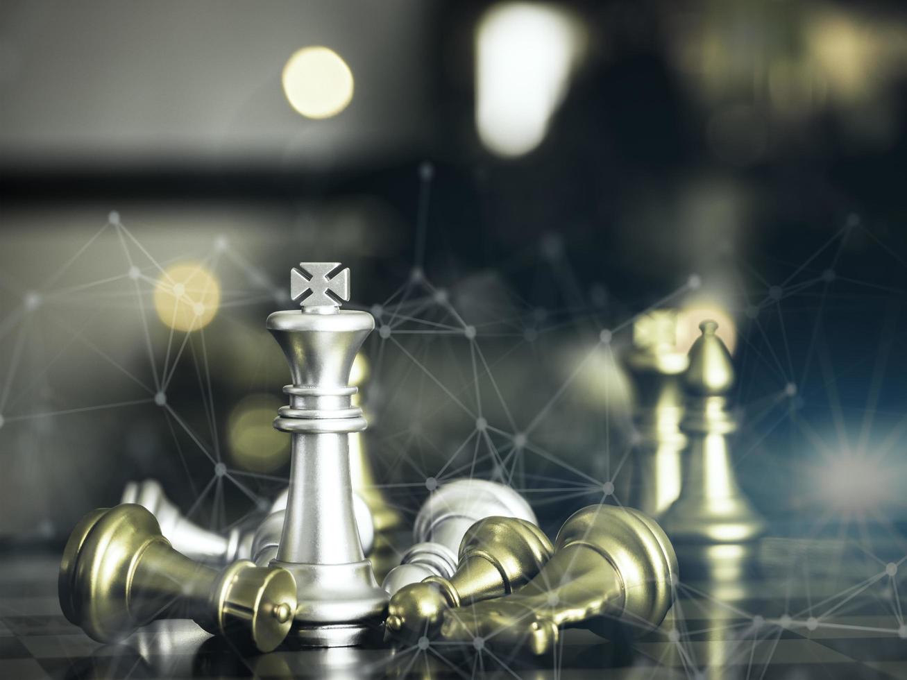 Golden king chess to fighting silver king chess to play successfully in the competition with technology network background. Management or leadership strategy concept. photo