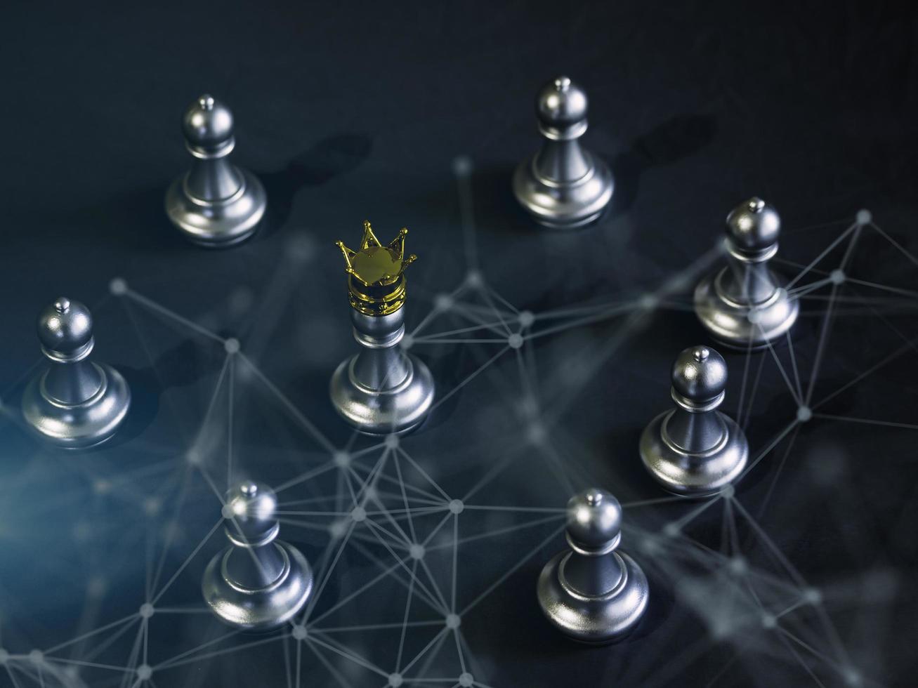 Silver chess pawn wear gold crown is surrounded by falling around silver chess pieces to fighting with communication technology network teamwork to victory, business strategy concept. photo
