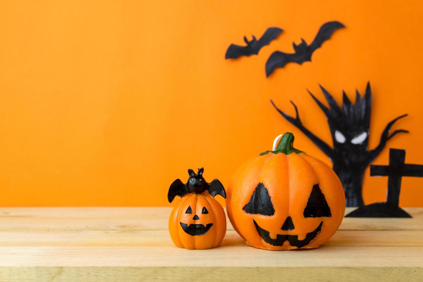 Halloween Pumpkins on wooden table photo