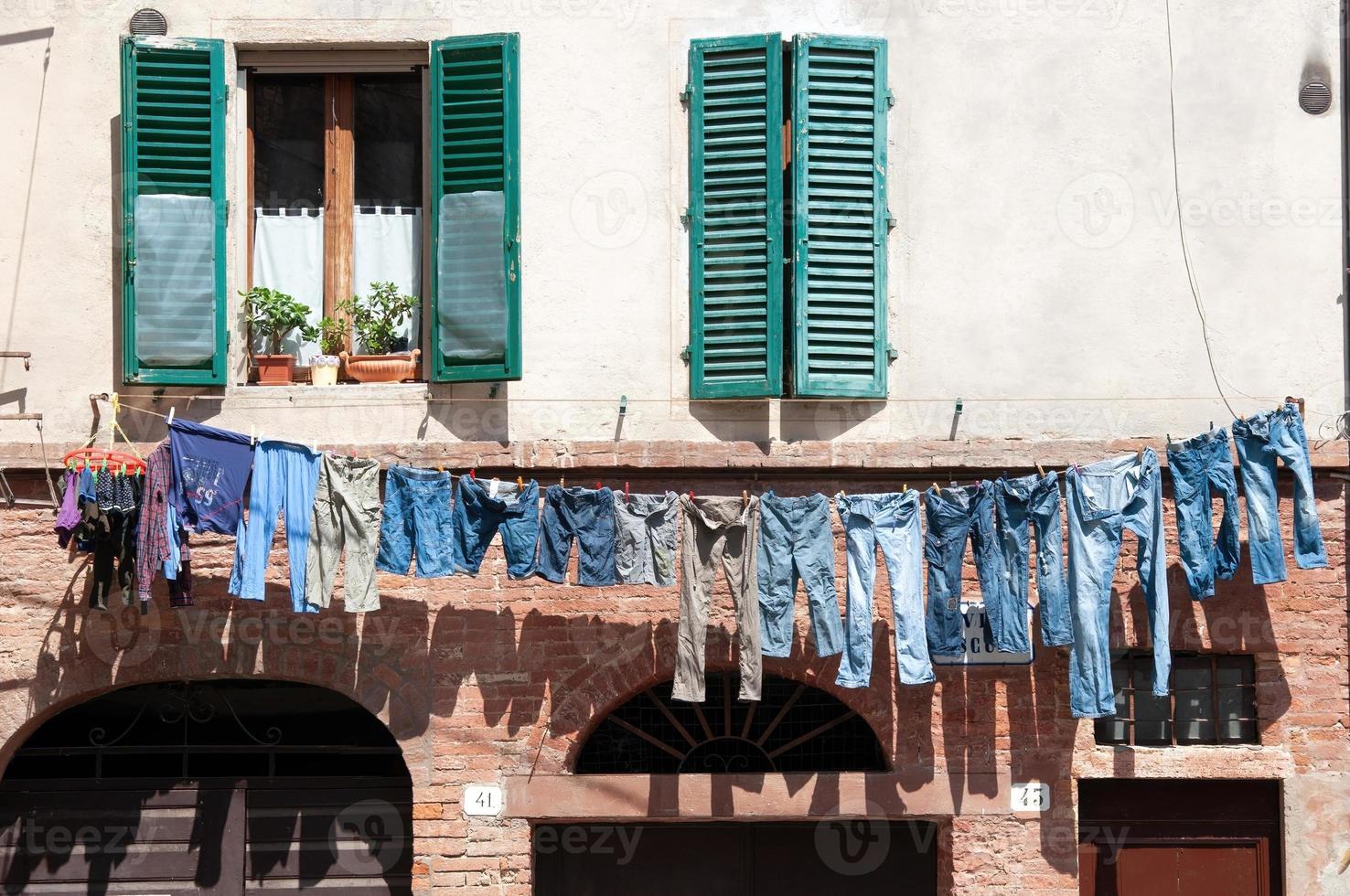 clothesline in front of house photo