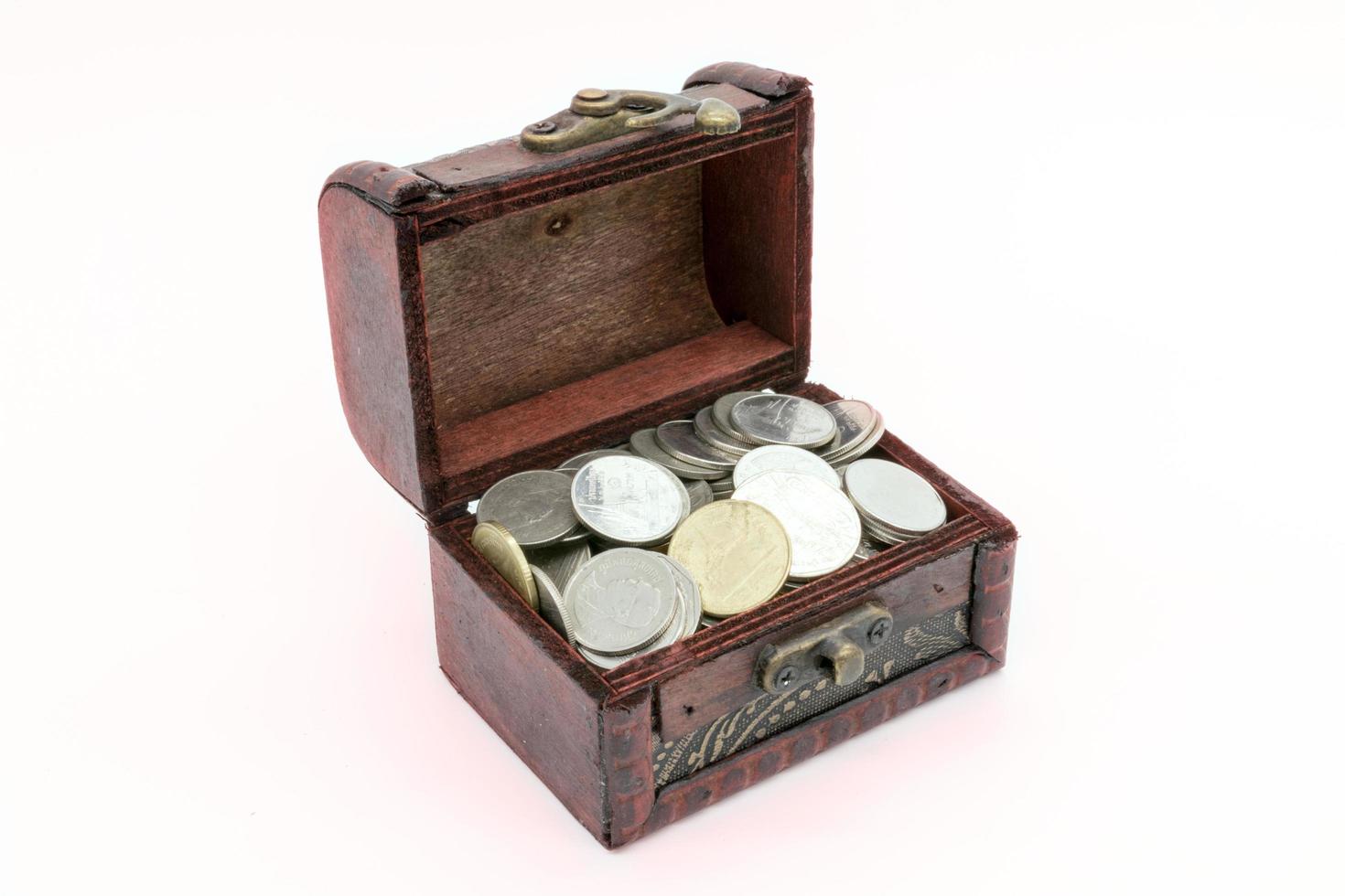 Old wooden chest with golden coins photo