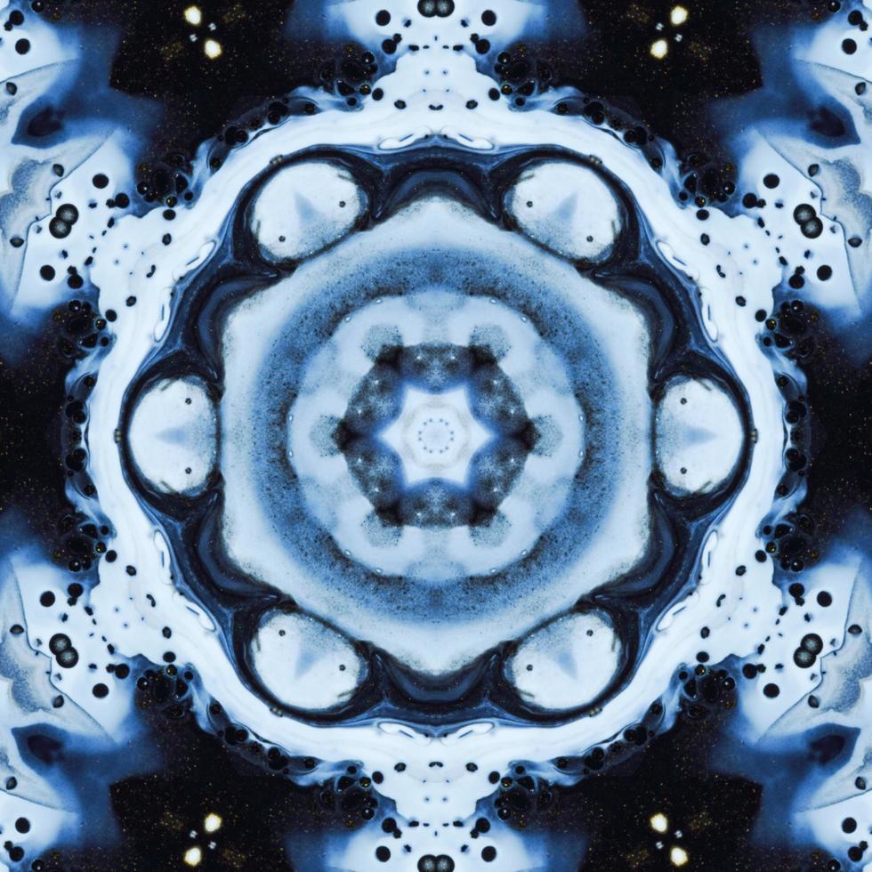 Dark reflection abstract background. Kaleidoscope pattern in black and blue color. Free photo. photo