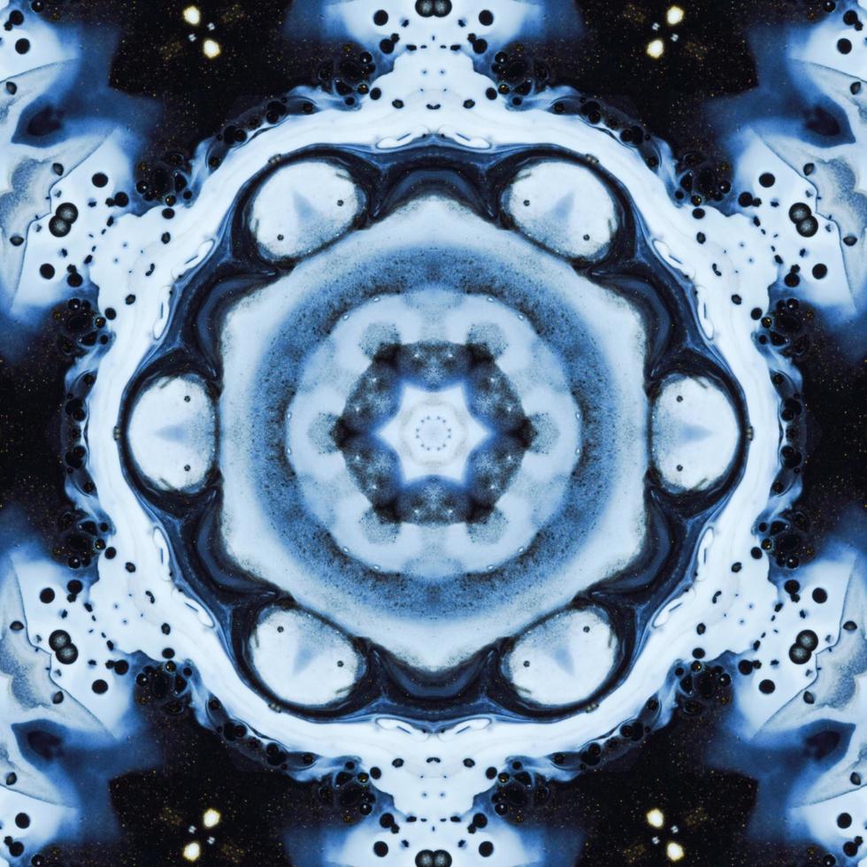 Dark reflection abstract background. Kaleidoscope pattern in black and blue color. Free photo. photo