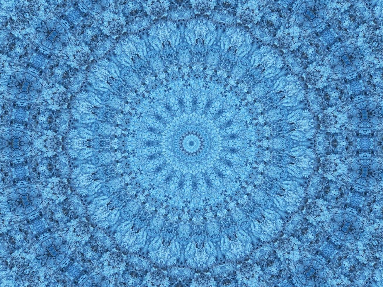 Geometry kaleidoscope pattern. Light blue abstract background. Free photo. photo