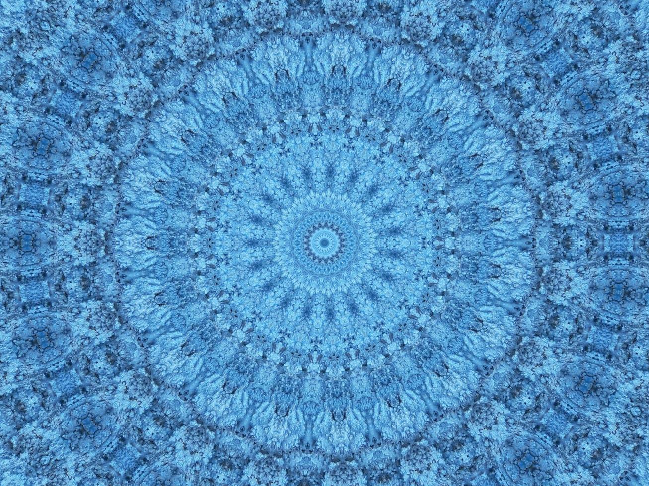 Geometry kaleidoscope pattern. Light blue abstract background. Free photo. photo