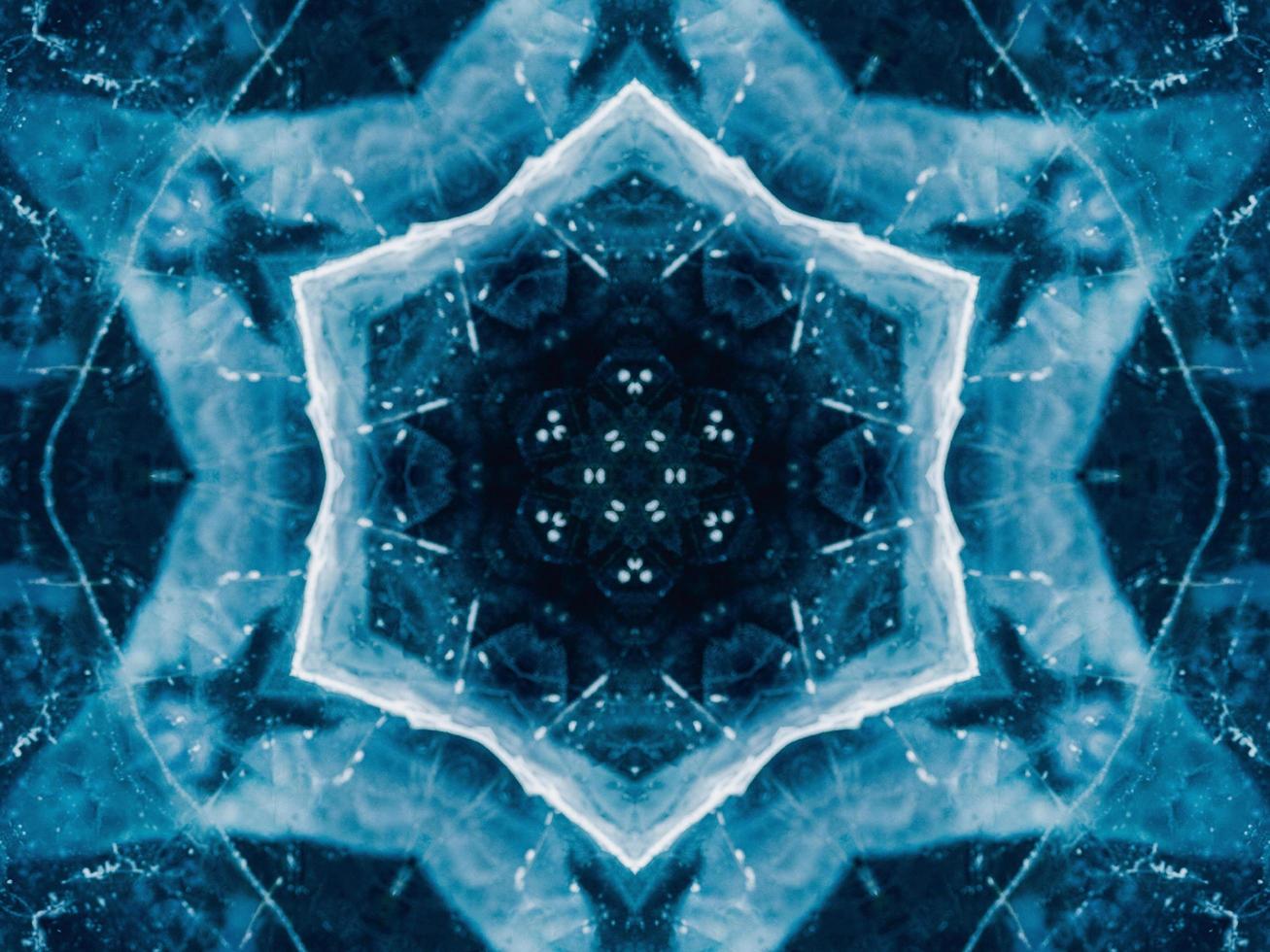 Reflection of deep blue sea in kaleidoscope pattern. Dark blue abstract background. Free photo. photo