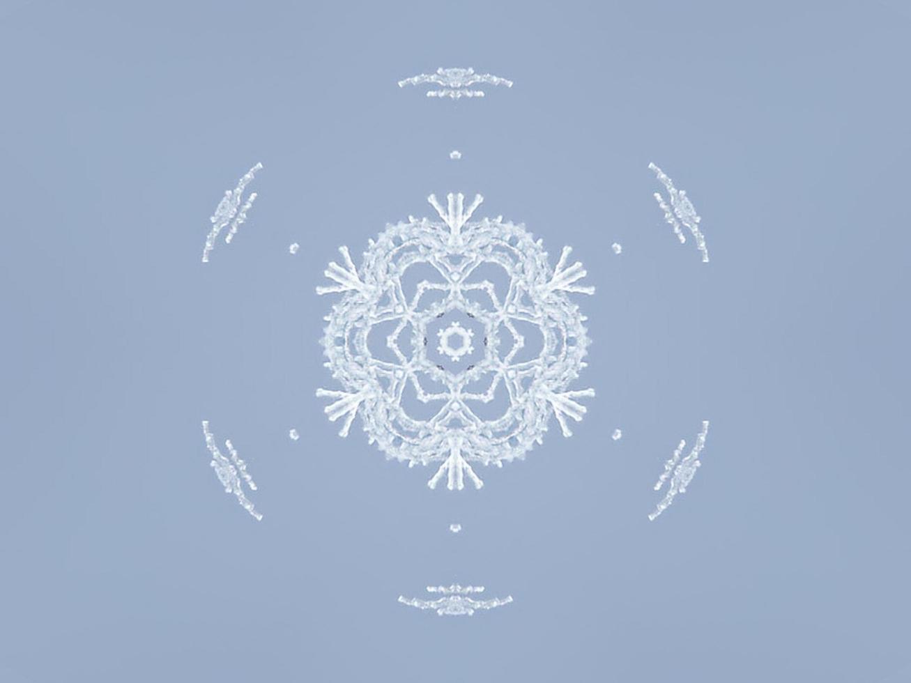 White snow kaleidoscope pattern. Abstract background with winter theme. Free photo. photo