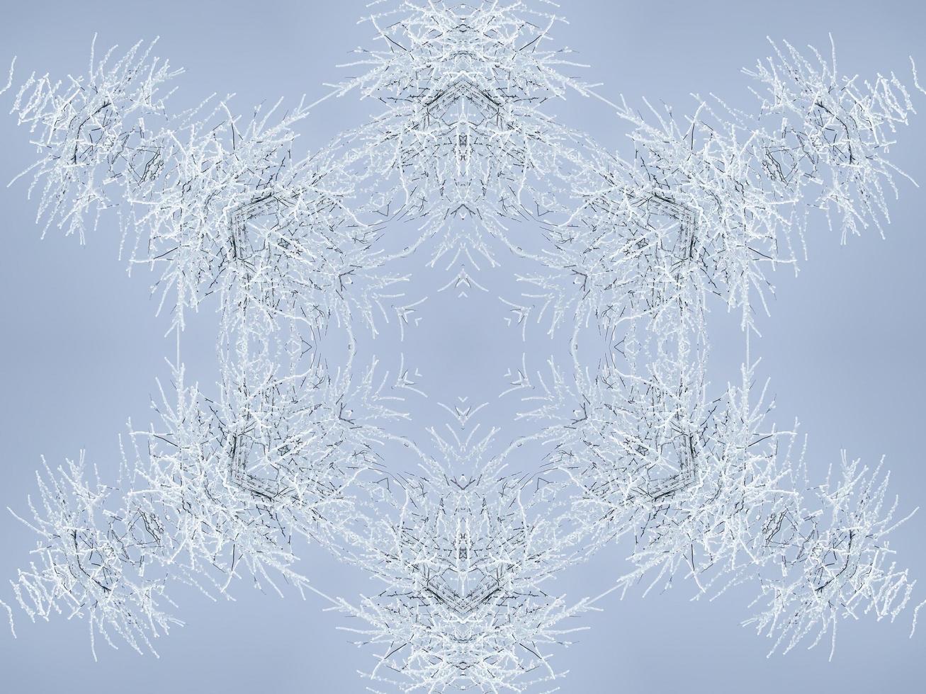 White snow kaleidoscope pattern. Abstract background with winter theme. Free photo. photo