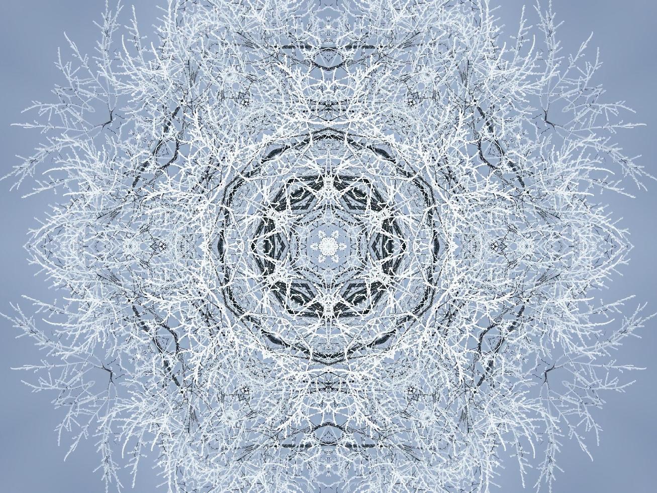 White snow kaleidoscope pattern. Abstract background with winter theme. Free photo. photo